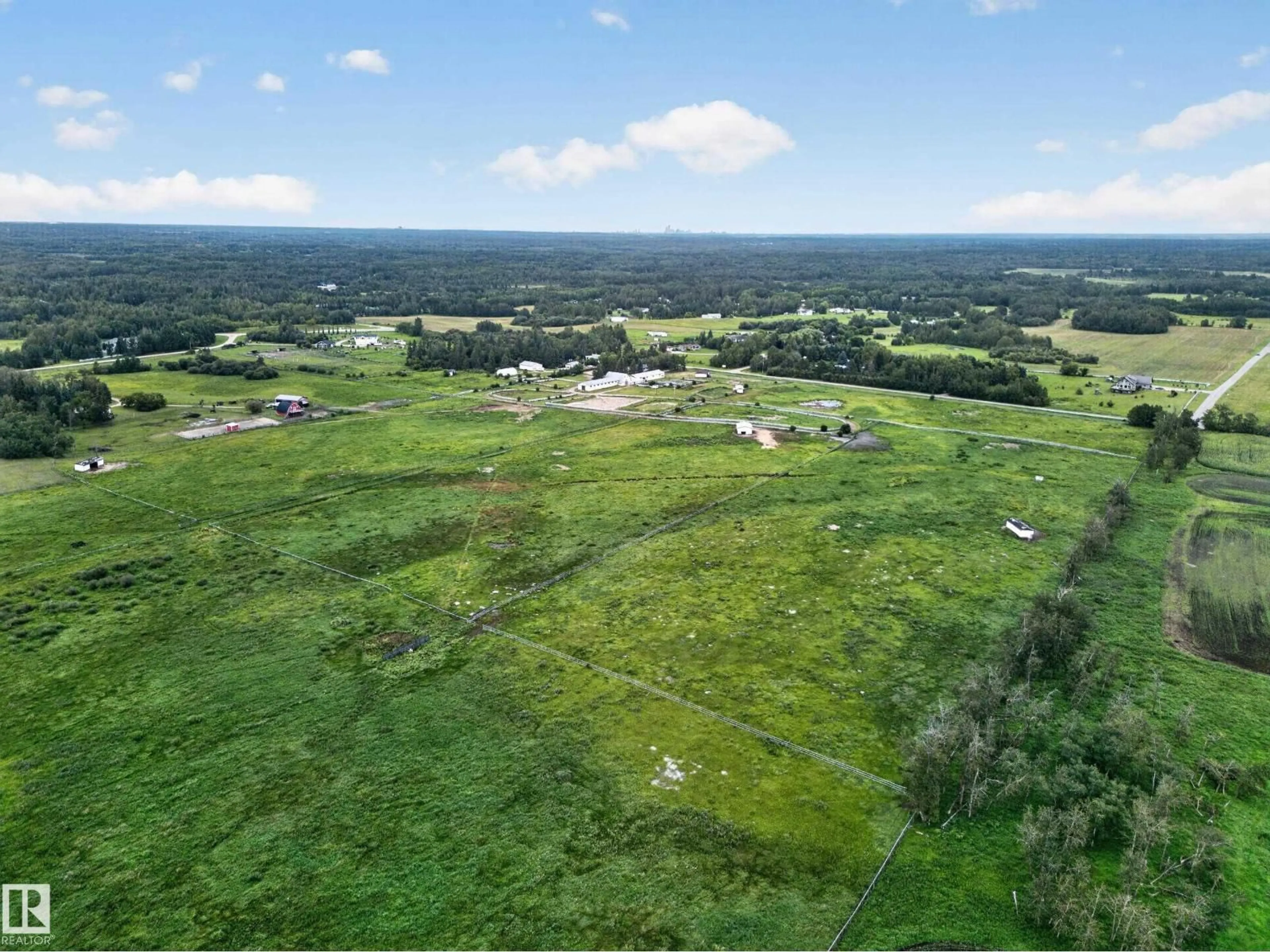 A pic from outside/outdoor area/front of a property/back of a property/a pic from drone, unknown for 51208 RANGE ROAD 270, Rural Parkland County Alberta T7Y1G7