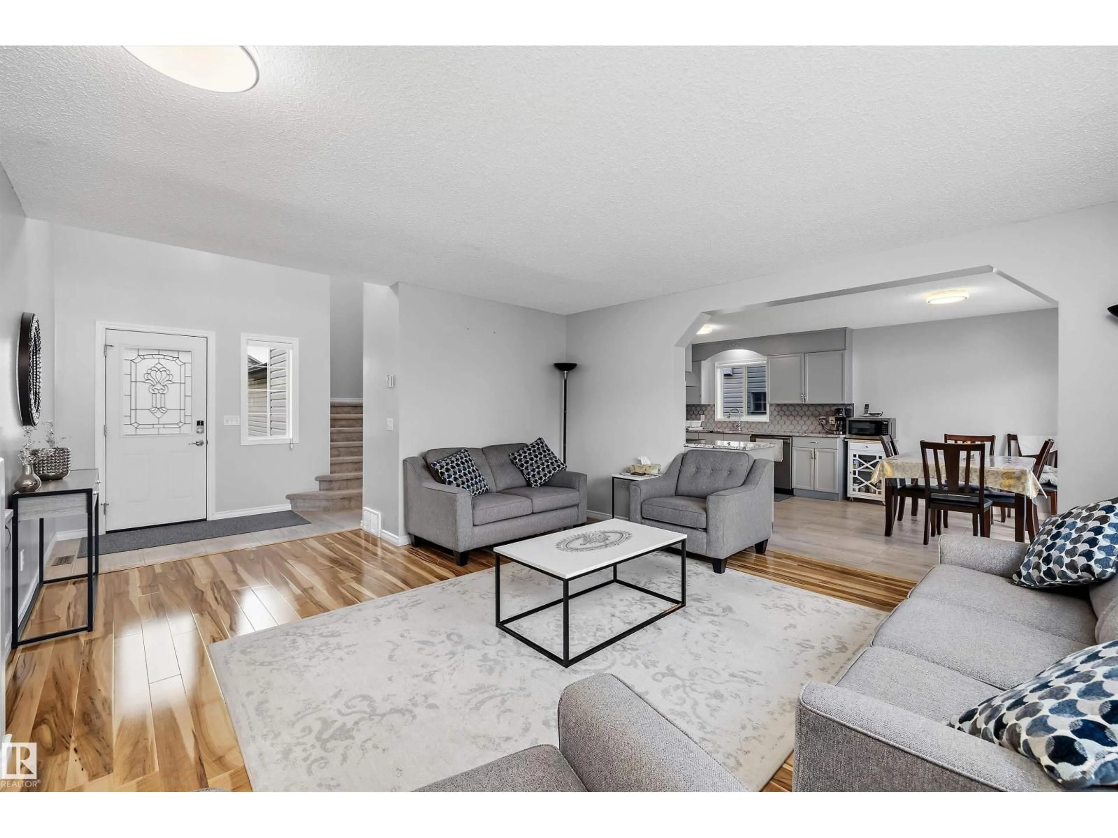 Living room with furniture, unknown for NW - 11528 168 AV, Edmonton Alberta T5X6B6