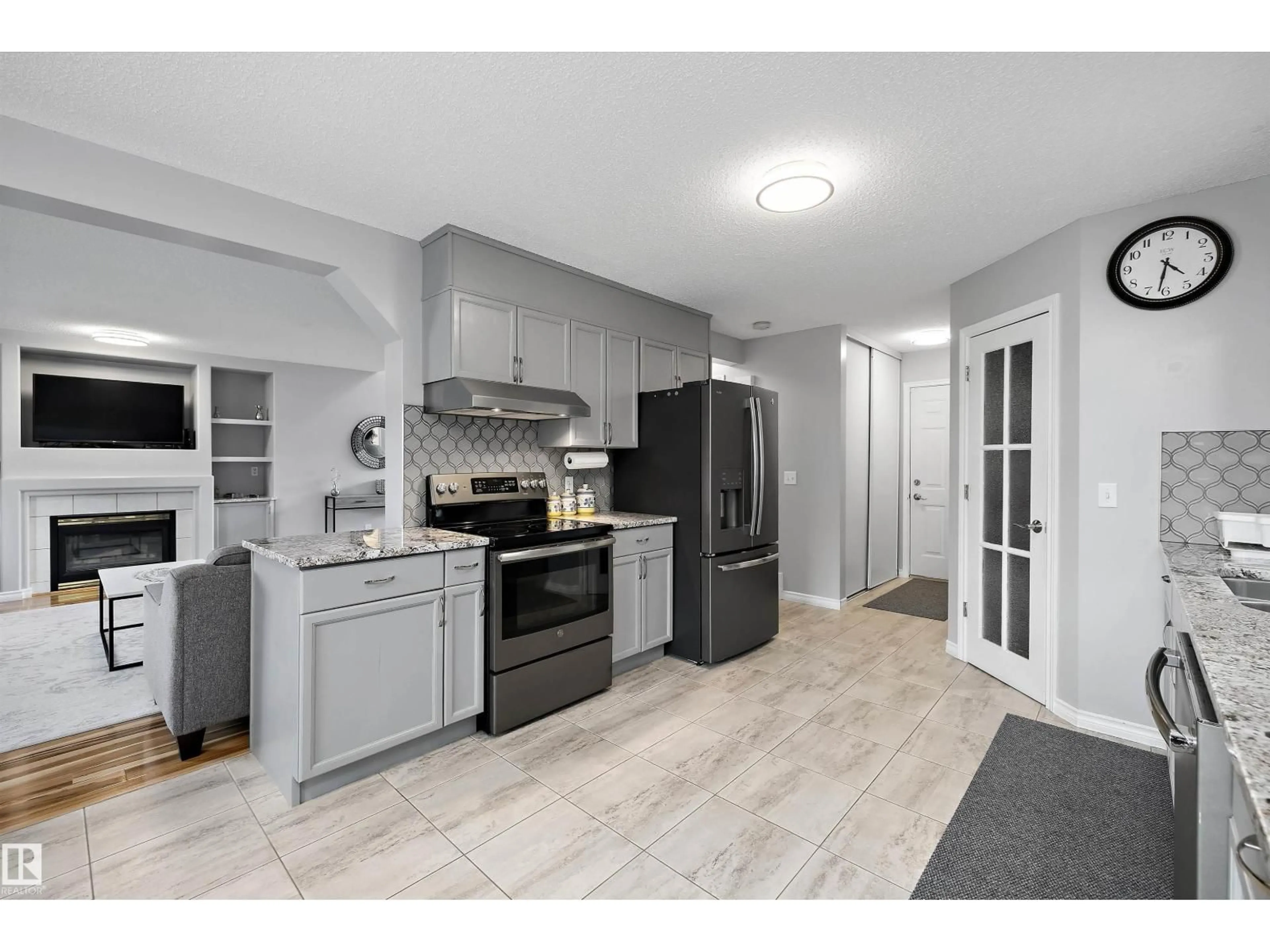 Open concept kitchen, ceramic/tile floor for NW - 11528 168 AV, Edmonton Alberta T5X6B6