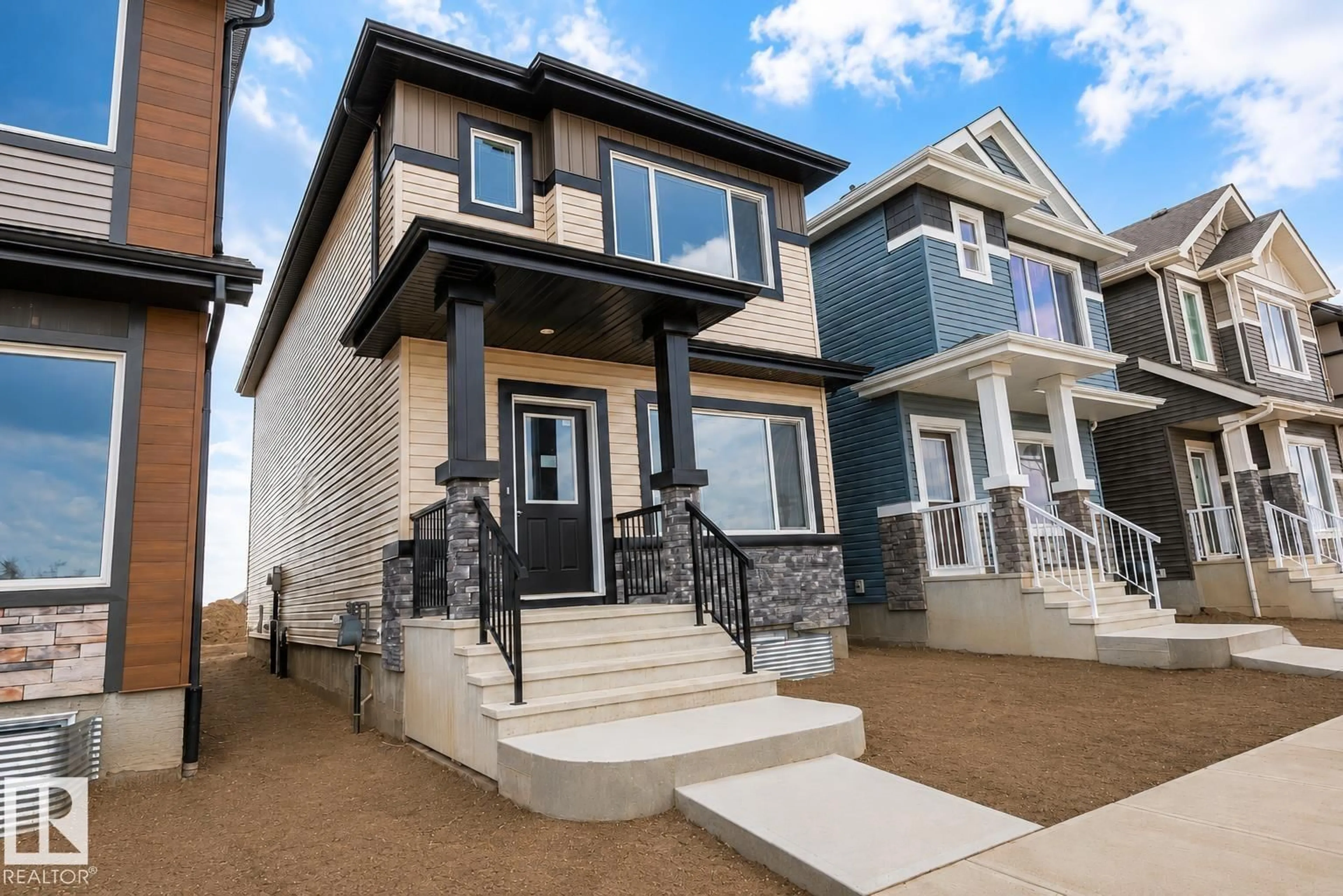 Home with vinyl exterior material, street for NE - 219 157 AV, Edmonton Alberta T5Y4M1