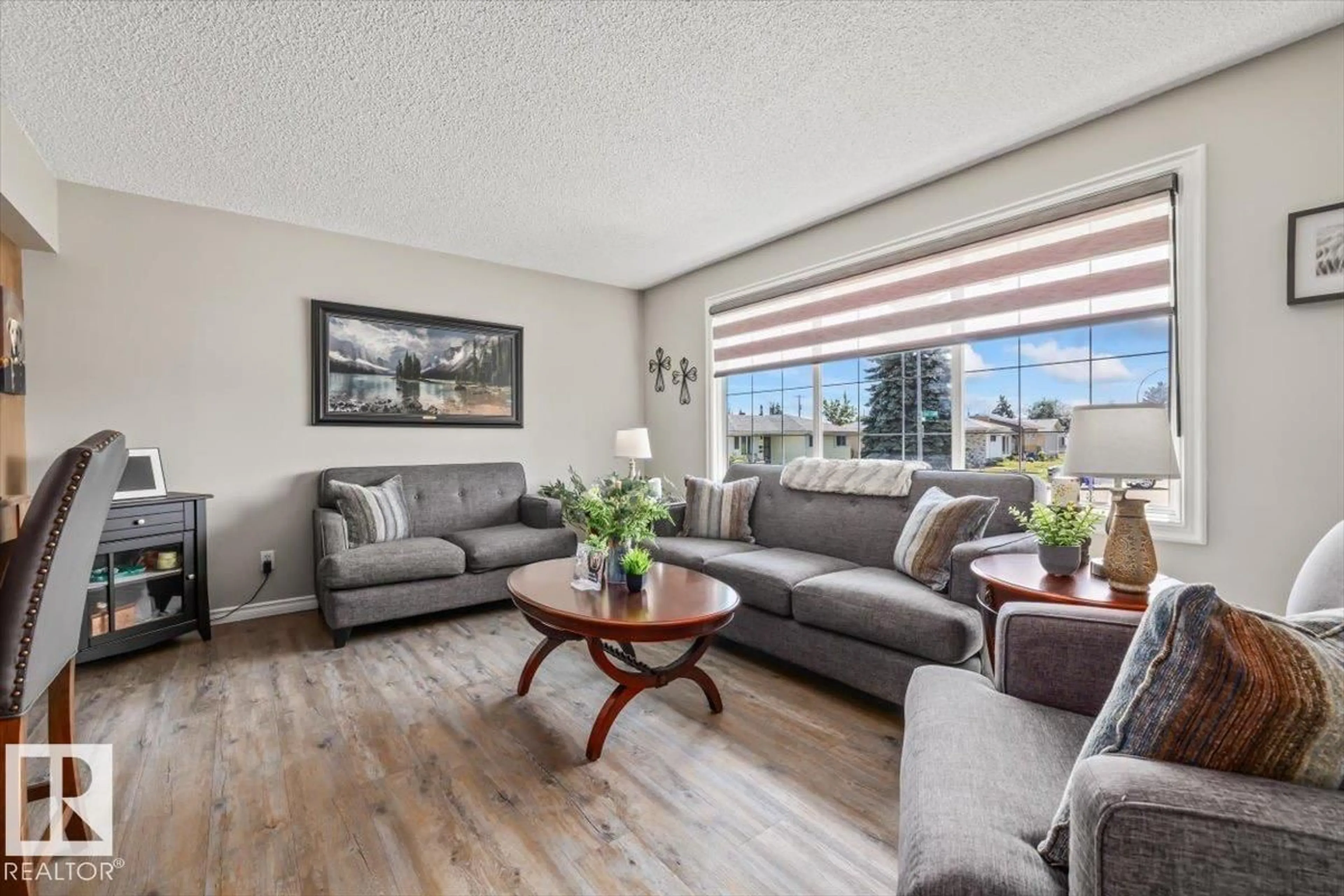 Living room with furniture, unknown for 7408 133 AV, Edmonton Alberta T5C2E4