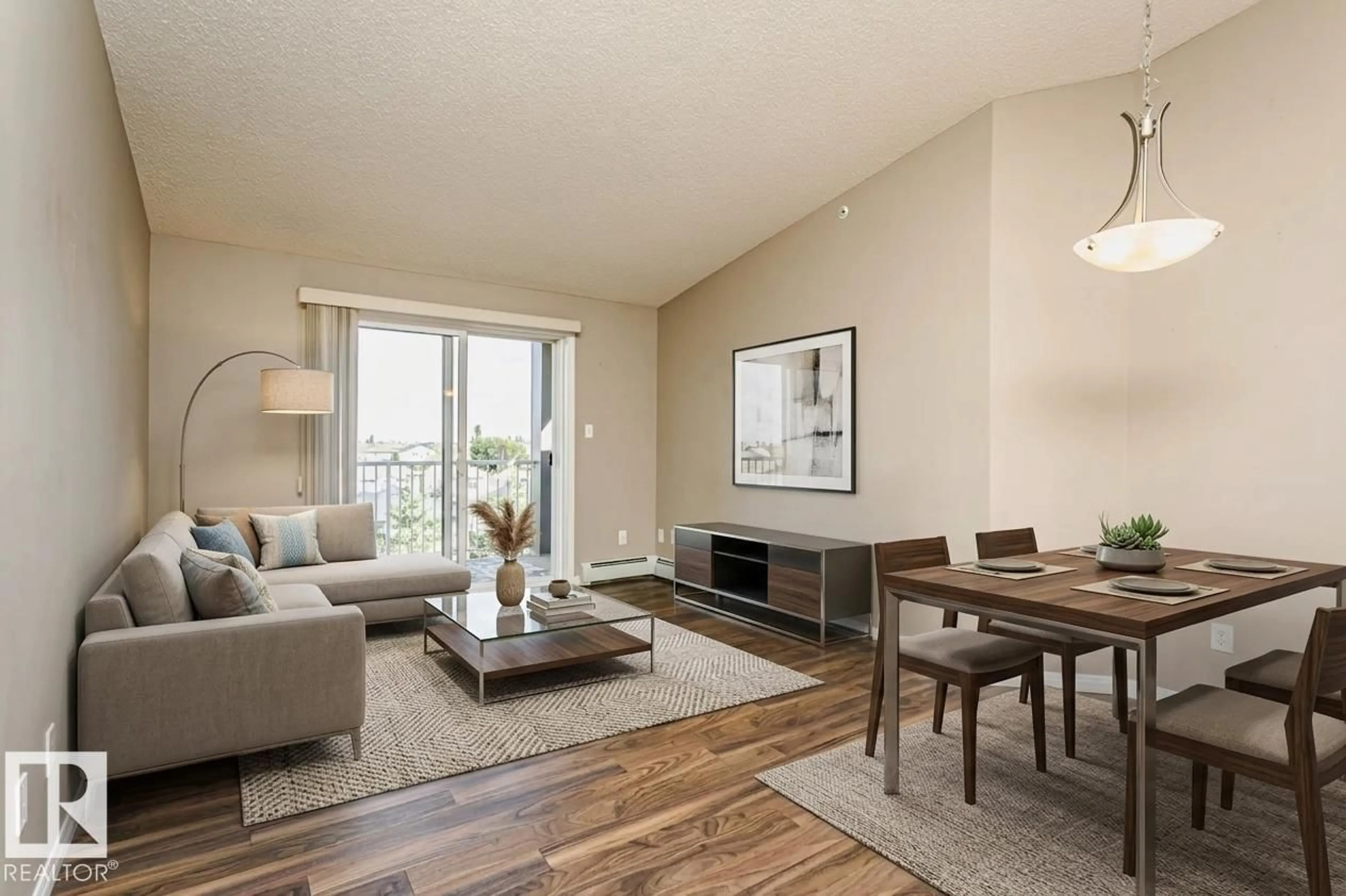 Living room with furniture, wood/laminate floor for 411 - 3425 19 ST, Edmonton Alberta T6T2B5