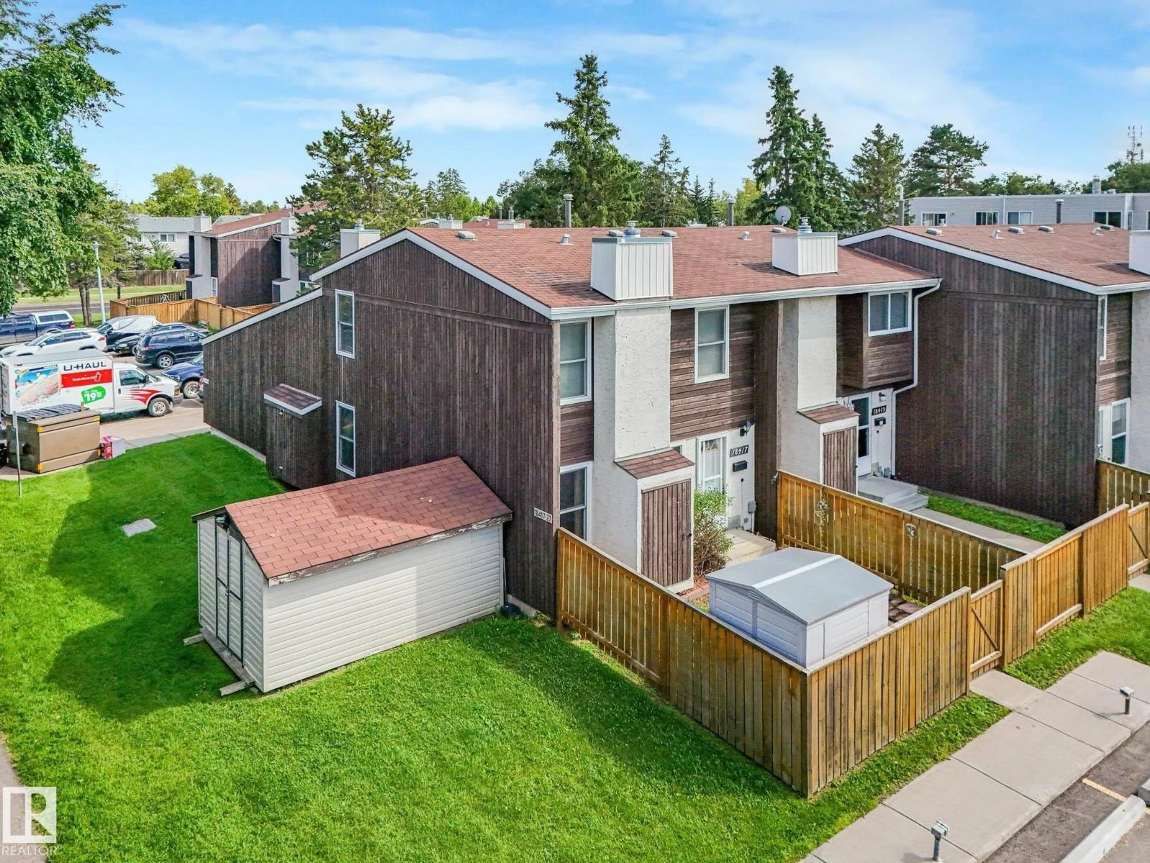 A pic from outside/outdoor area/front of a property/back of a property/a pic from drone, street for NW - 18417 66 AV, Edmonton Alberta T5T2M1