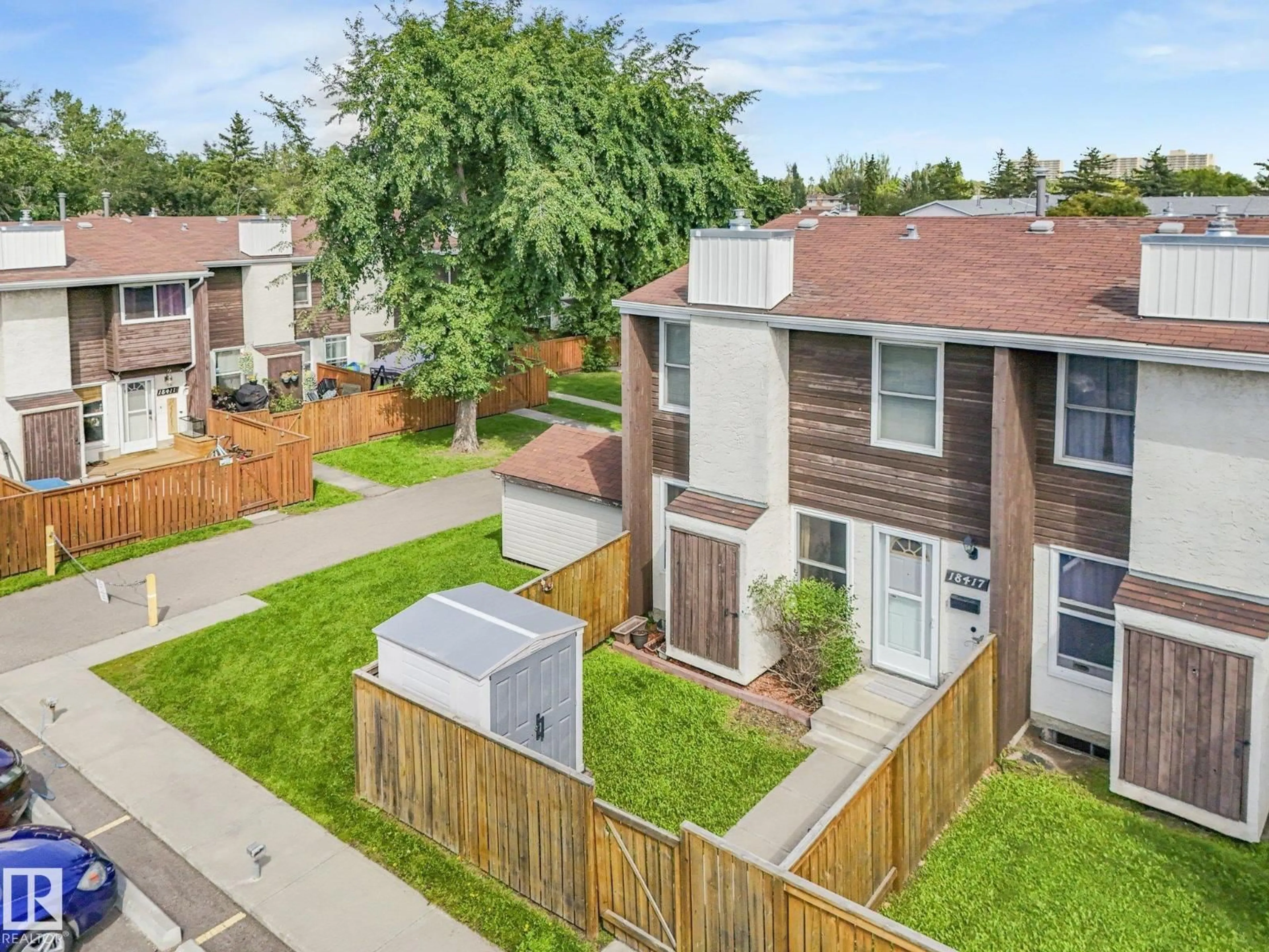 A pic from outside/outdoor area/front of a property/back of a property/a pic from drone, street for NW - 18417 66 AV, Edmonton Alberta T5T2M1