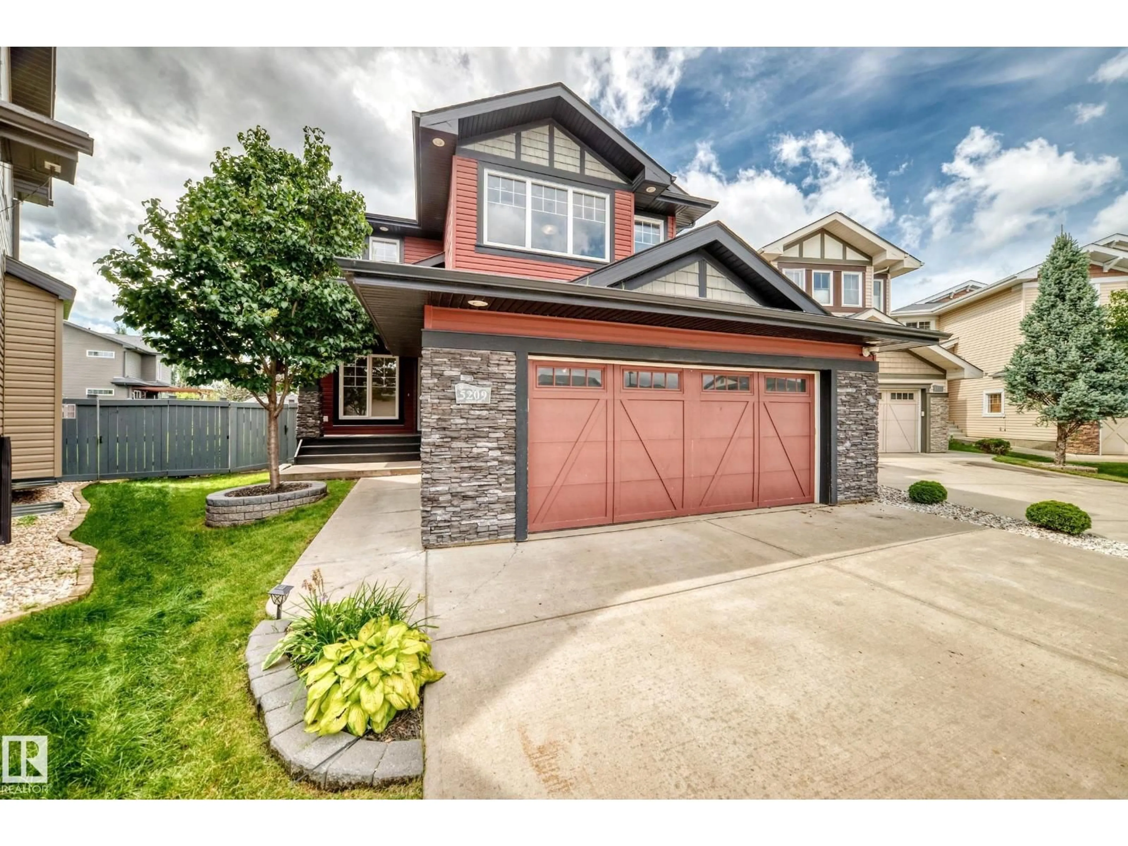Home with brick exterior material, street for 5209 GODSON BAY NW, Edmonton Alberta T5T4P8