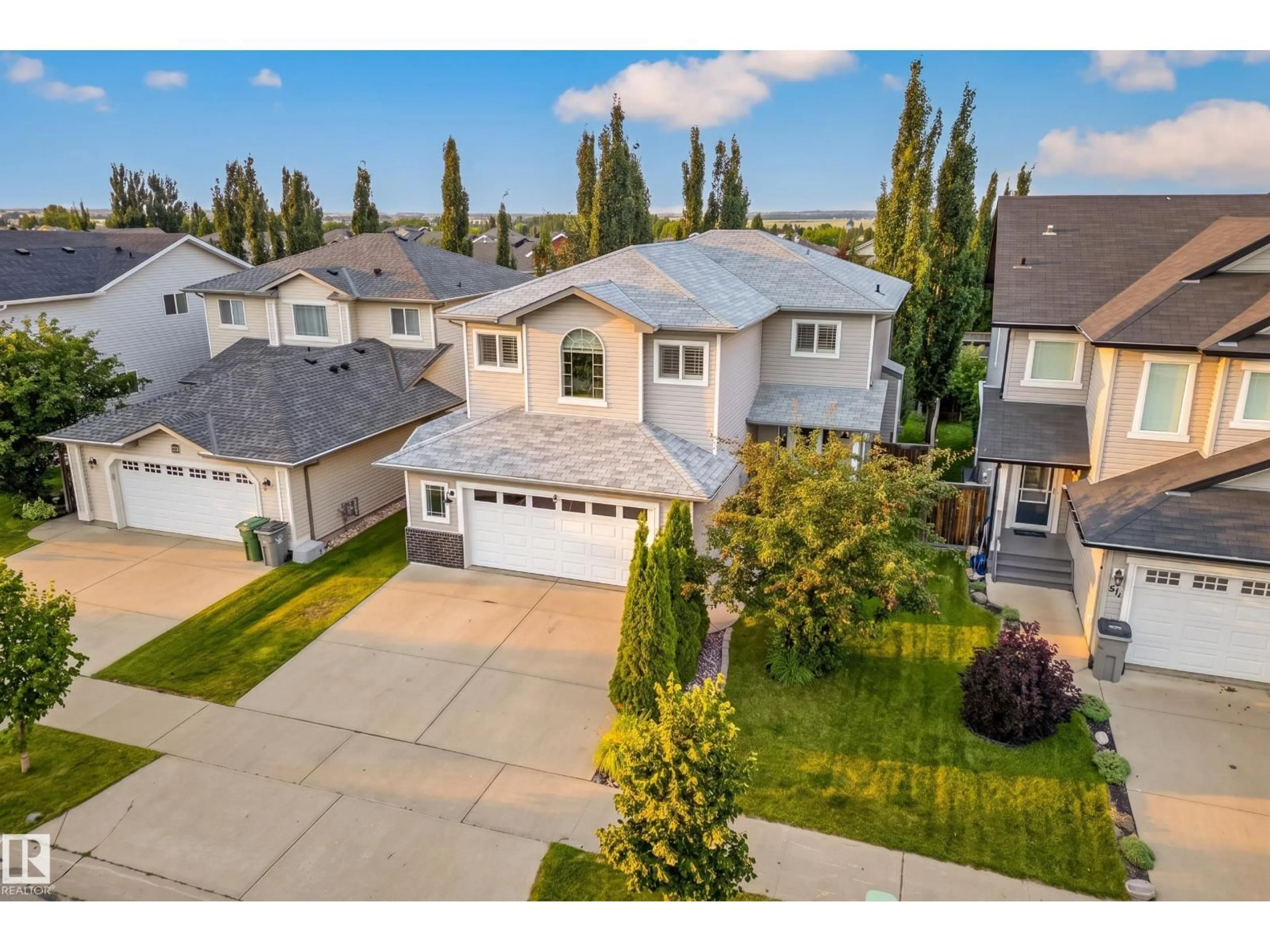 A pic from outside/outdoor area/front of a property/back of a property/a pic from drone, street for 62 CARRIERE CR, Beaumont Alberta T4X0C2