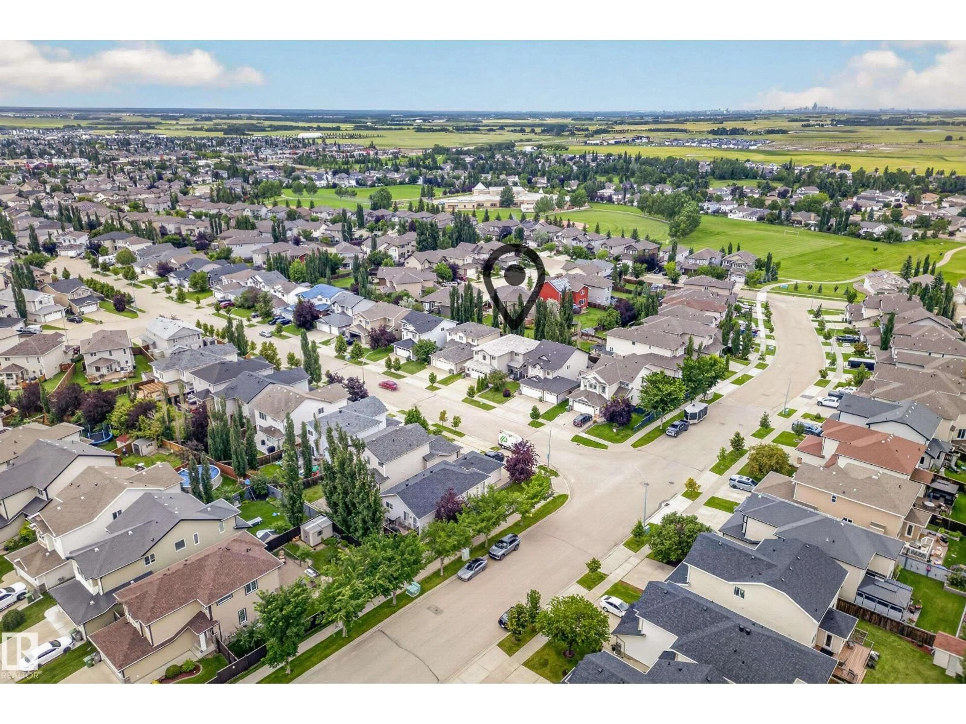 A pic from outside/outdoor area/front of a property/back of a property/a pic from drone, street for 62 CARRIERE CR, Beaumont Alberta T4X0C2