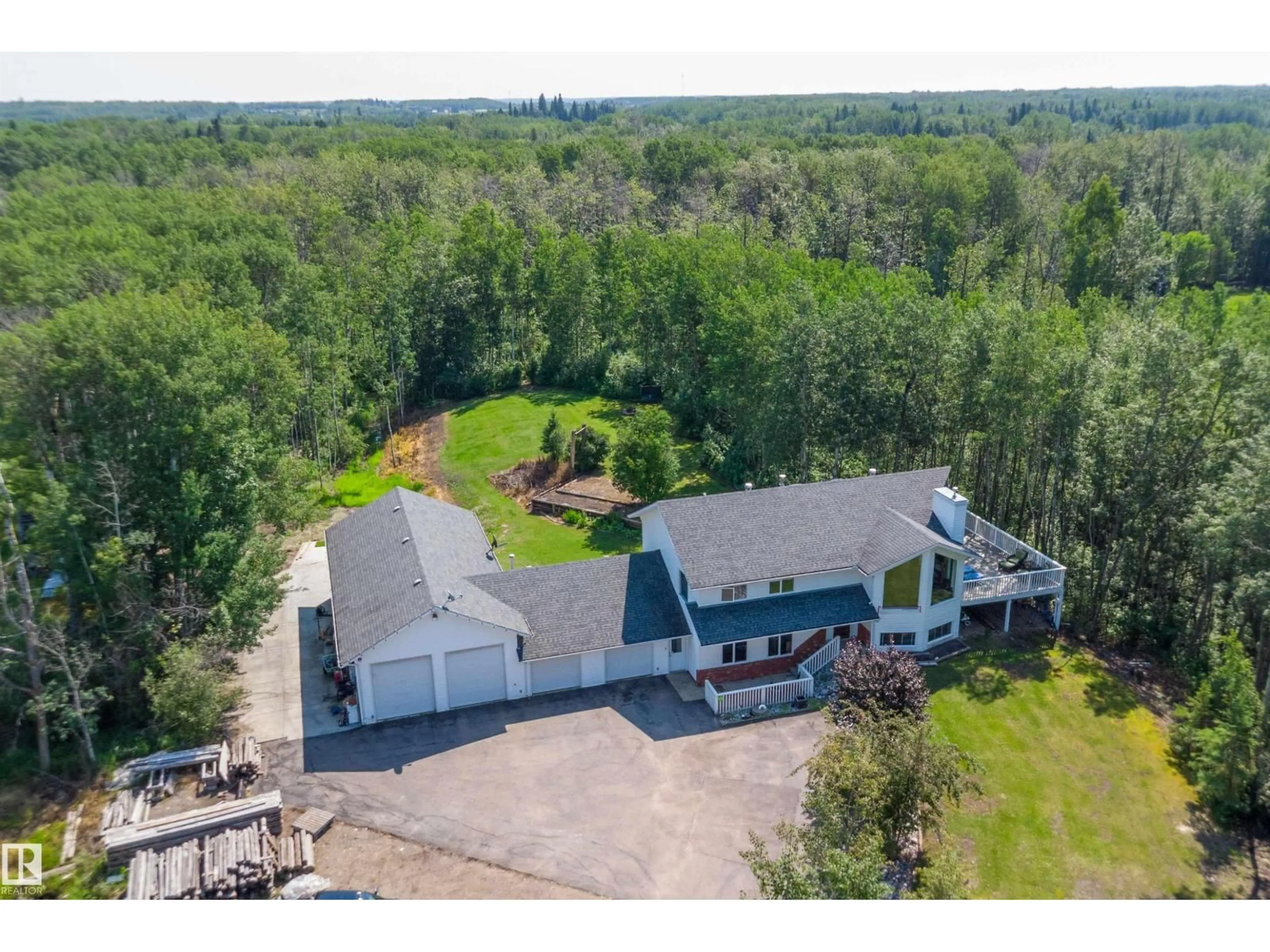 A pic from outside/outdoor area/front of a property/back of a property/a pic from drone, unknown for 21410 TWP ROAD 524, Rural Strathcona County Alberta T8E2H5