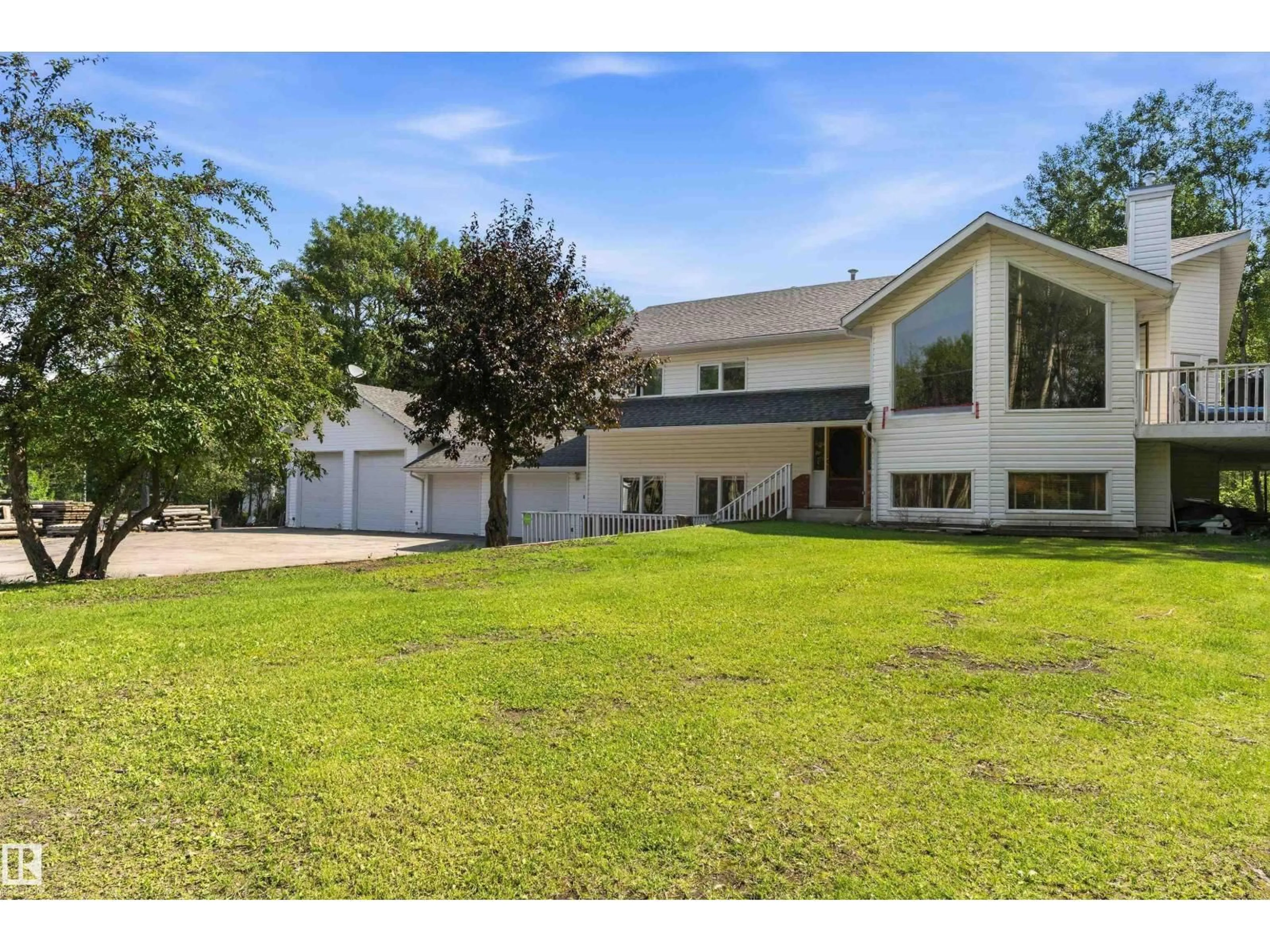 A pic from outside/outdoor area/front of a property/back of a property/a pic from drone, unknown for 21410 TWP ROAD 524, Rural Strathcona County Alberta T8E2H5