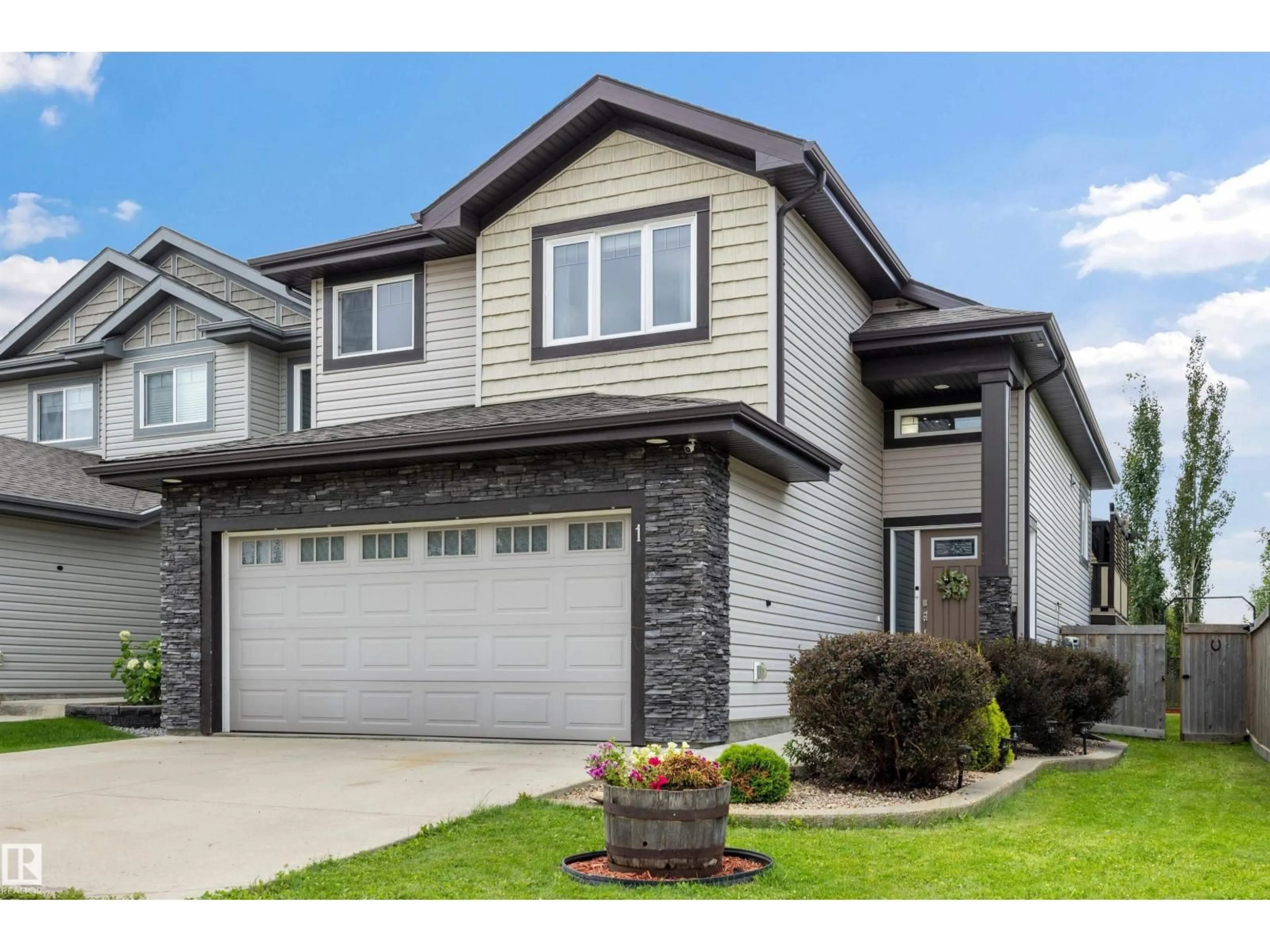 Home with vinyl exterior material, street for 1 DITTRICH AV, Fort Saskatchewan Alberta T8L0N3