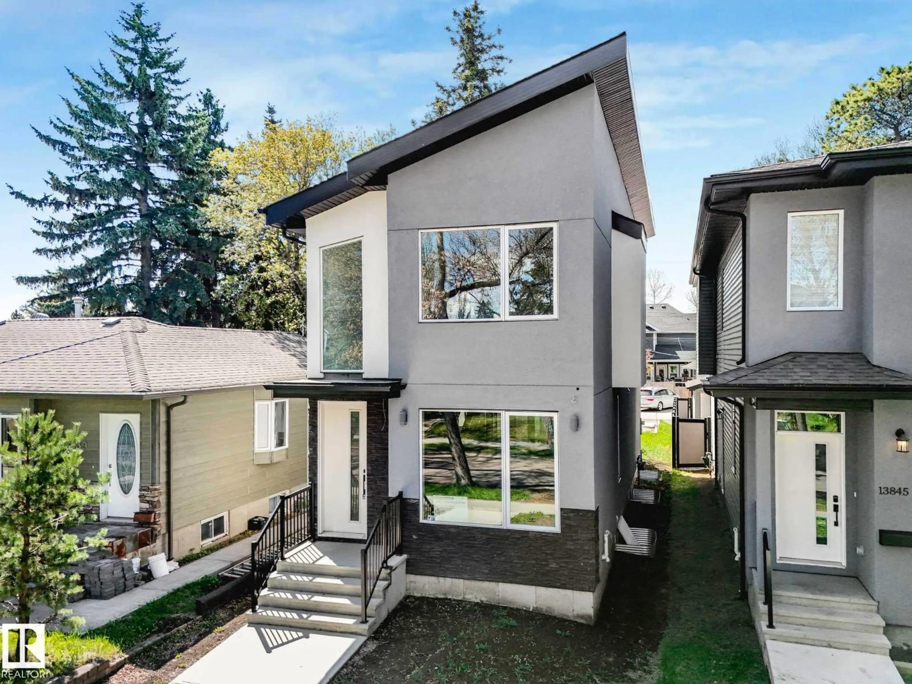 Home with vinyl exterior material, street for NW - 13843 110A AV, Edmonton Alberta T5M2N1