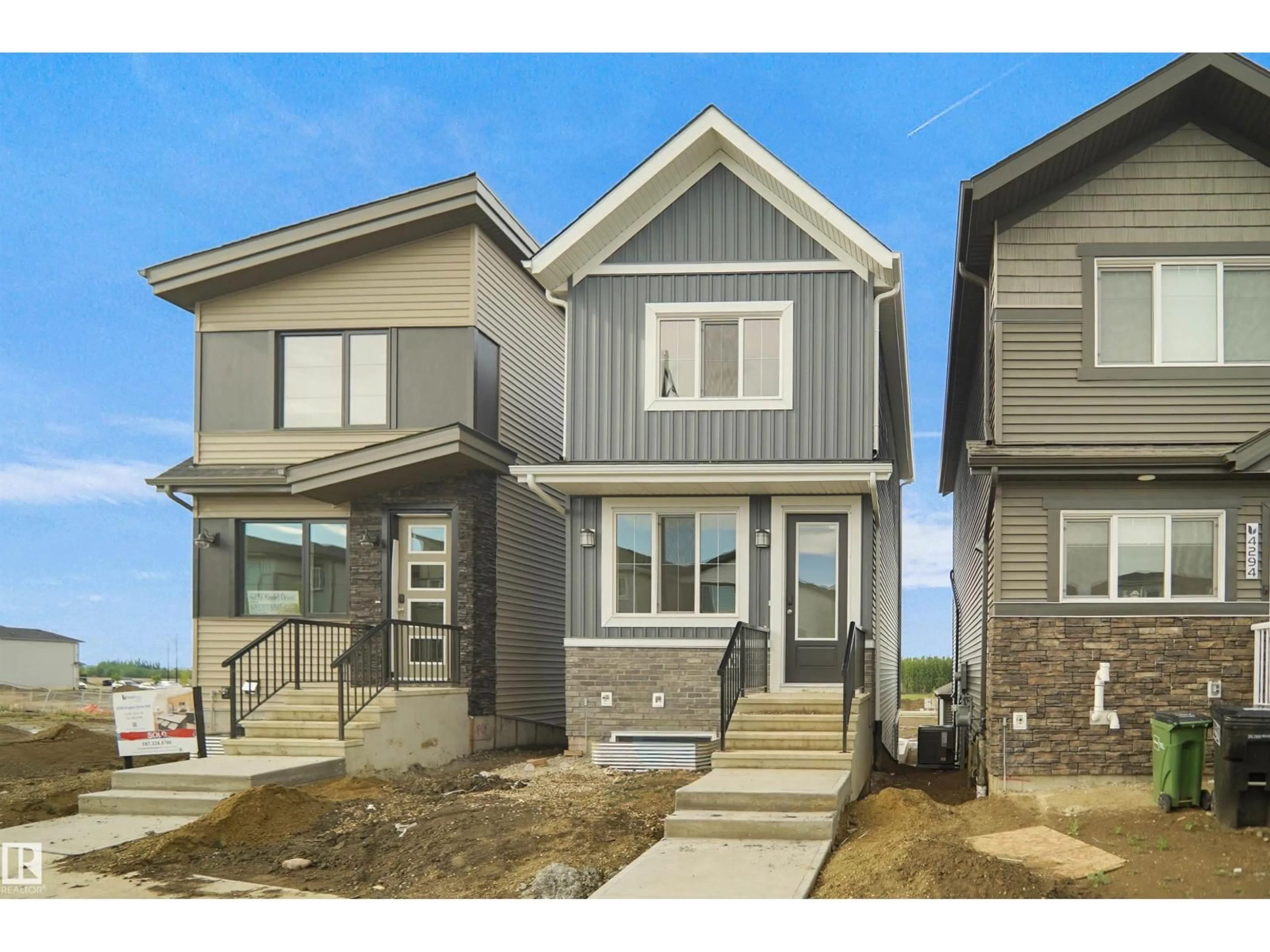 Home with vinyl exterior material, street for 4296 KINGLET DR, Edmonton Alberta T5S0T1