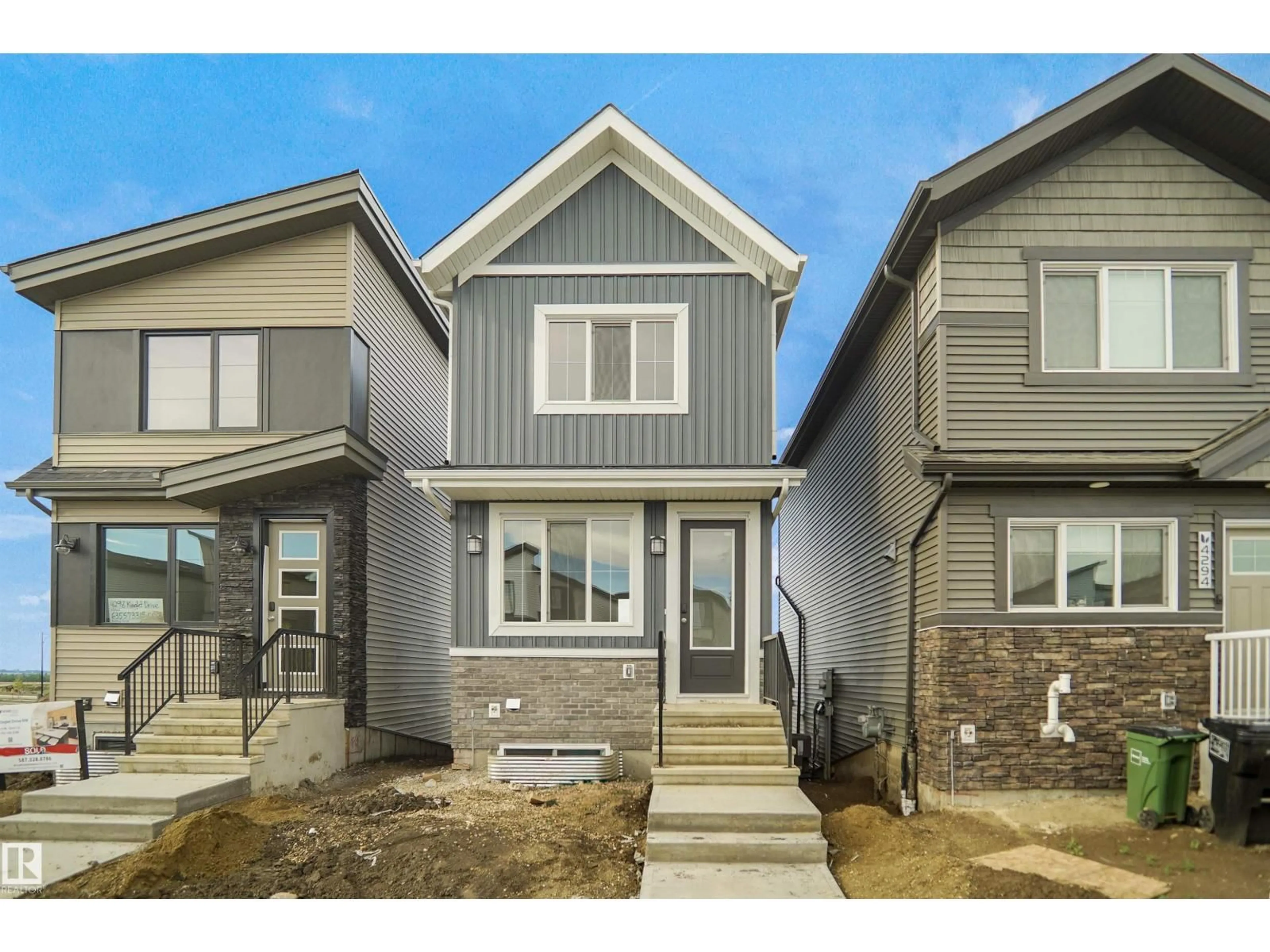 Home with vinyl exterior material, street for 4296 KINGLET DR, Edmonton Alberta T5S0T1