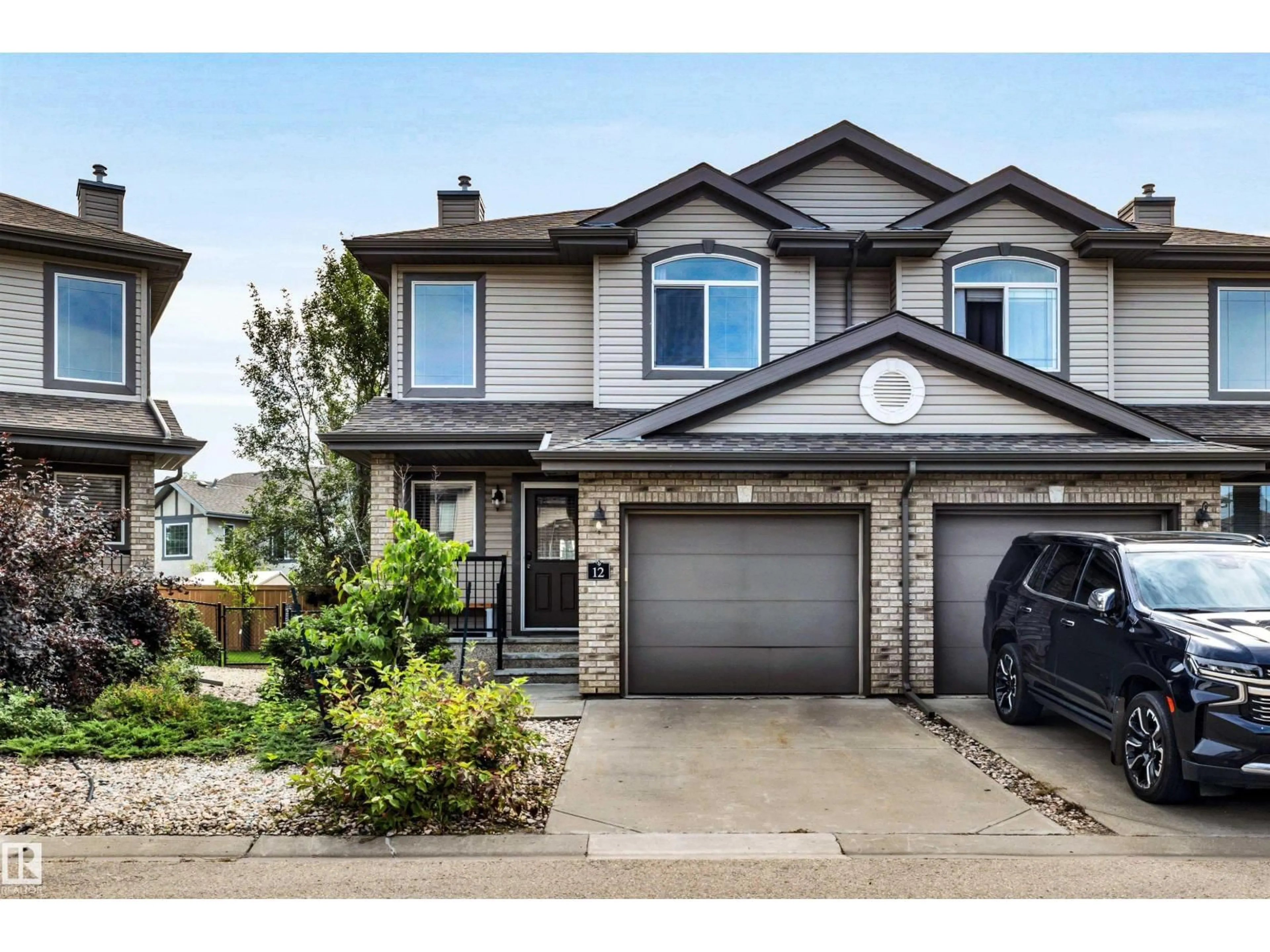 Home with vinyl exterior material, street for 20 - 12 NORMAN CT, St. Albert Alberta T8N7K4