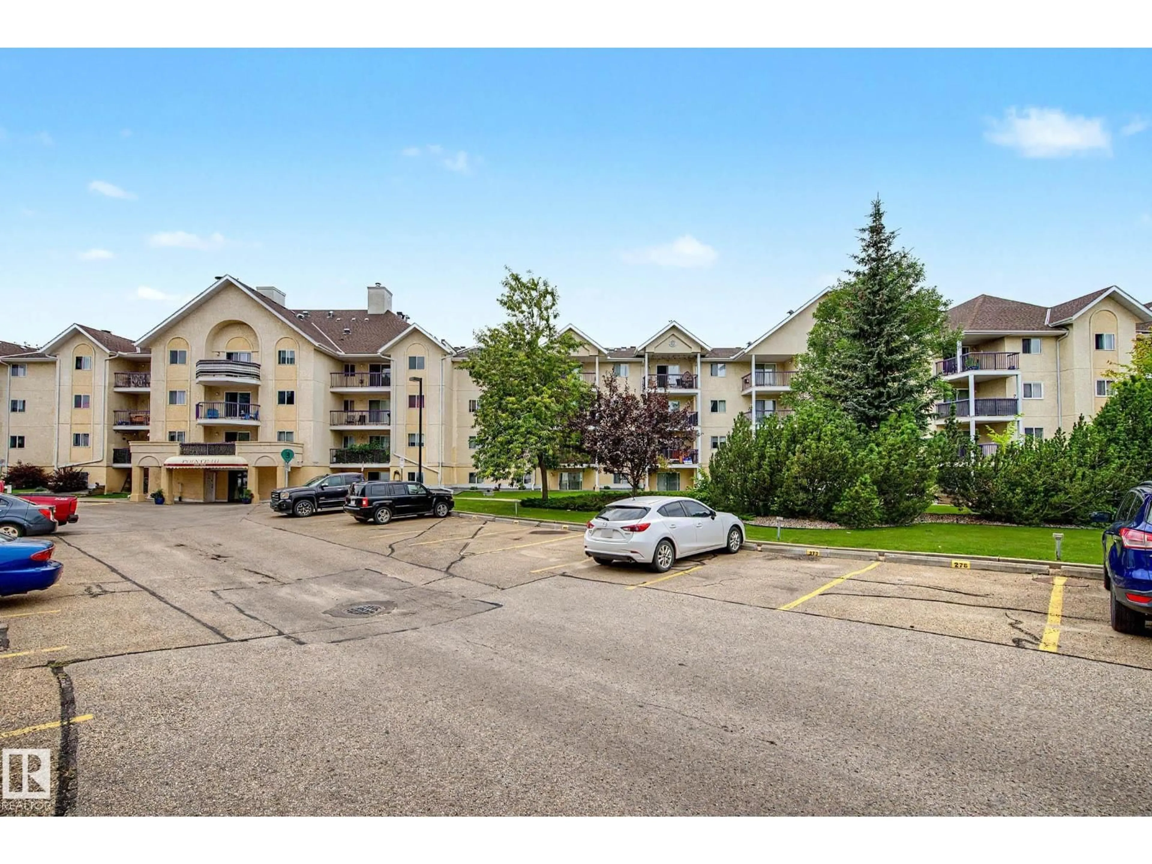 A pic from outside/outdoor area/front of a property/back of a property/a pic from drone, mountain view for 120 - 452 10520 NW, Edmonton Alberta T5H4L9