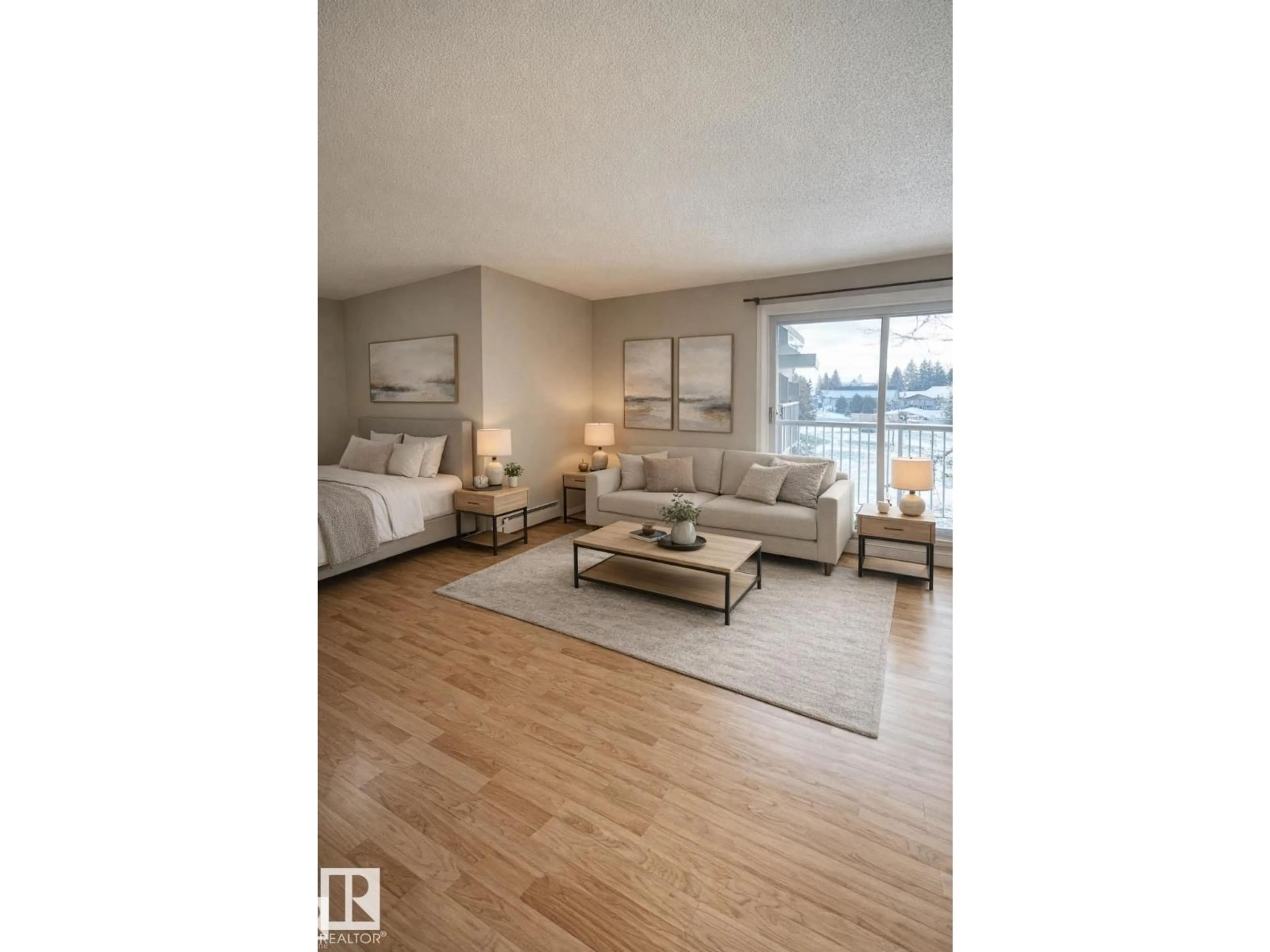 Living room with furniture, wood/laminate floor for 315 - 7220 144 AV, Edmonton Alberta T5C3E4