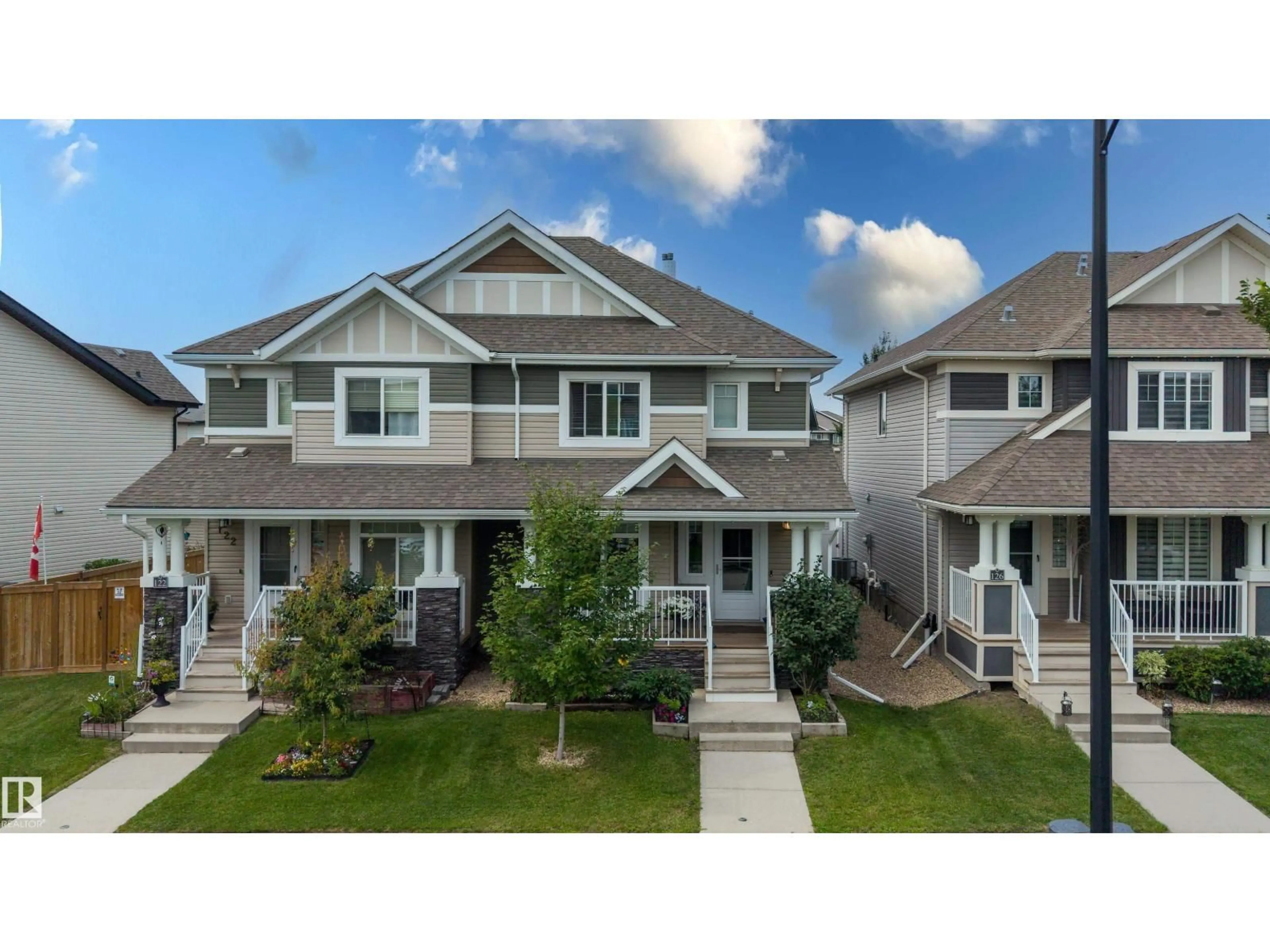 Home with vinyl exterior material, street for 124 CY BECKER BV, Edmonton Alberta T5Y0X9