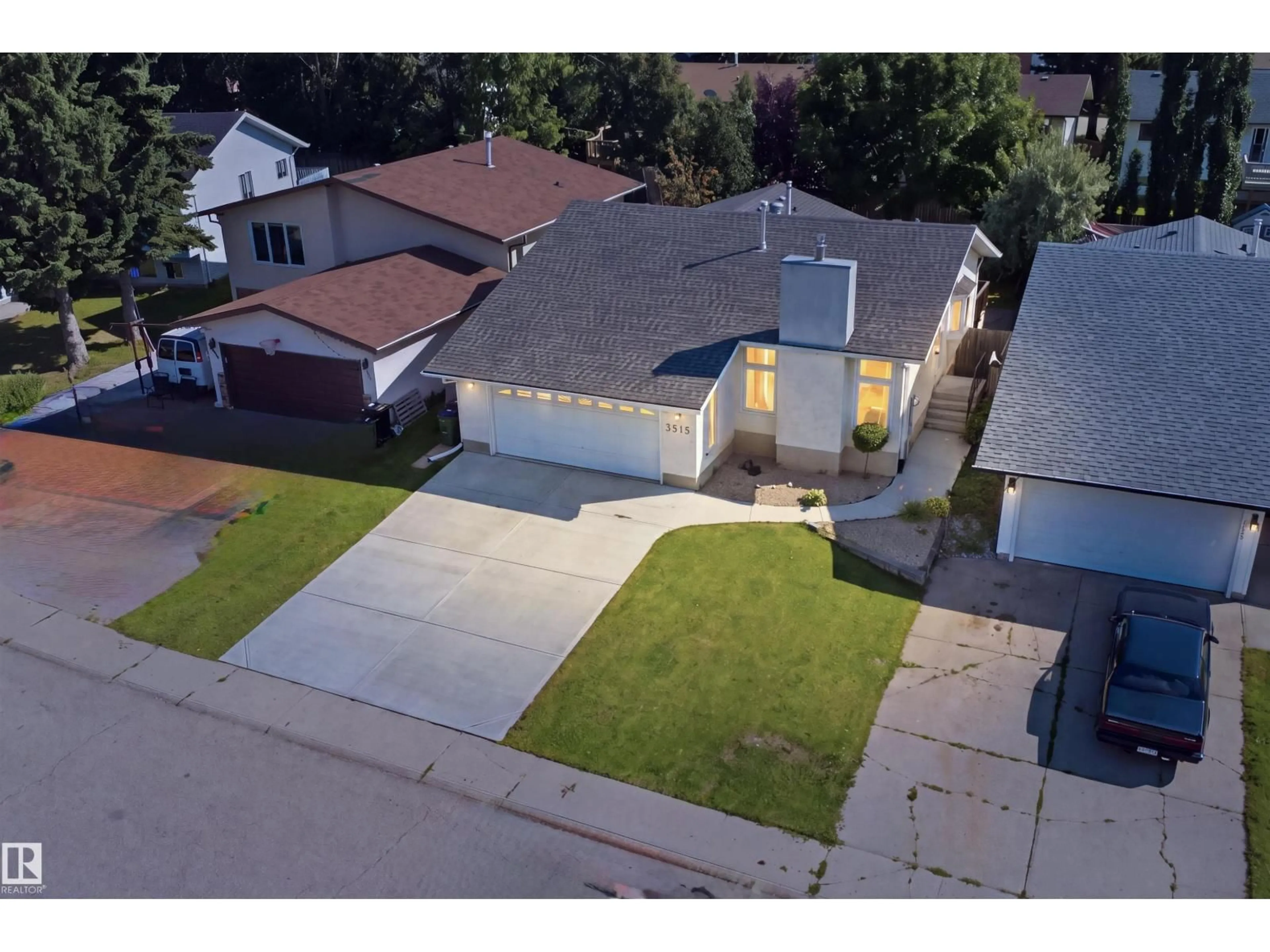 A pic from outside/outdoor area/front of a property/back of a property/a pic from drone, street for 3515 20 AVE NW, Edmonton Alberta T6L3E2
