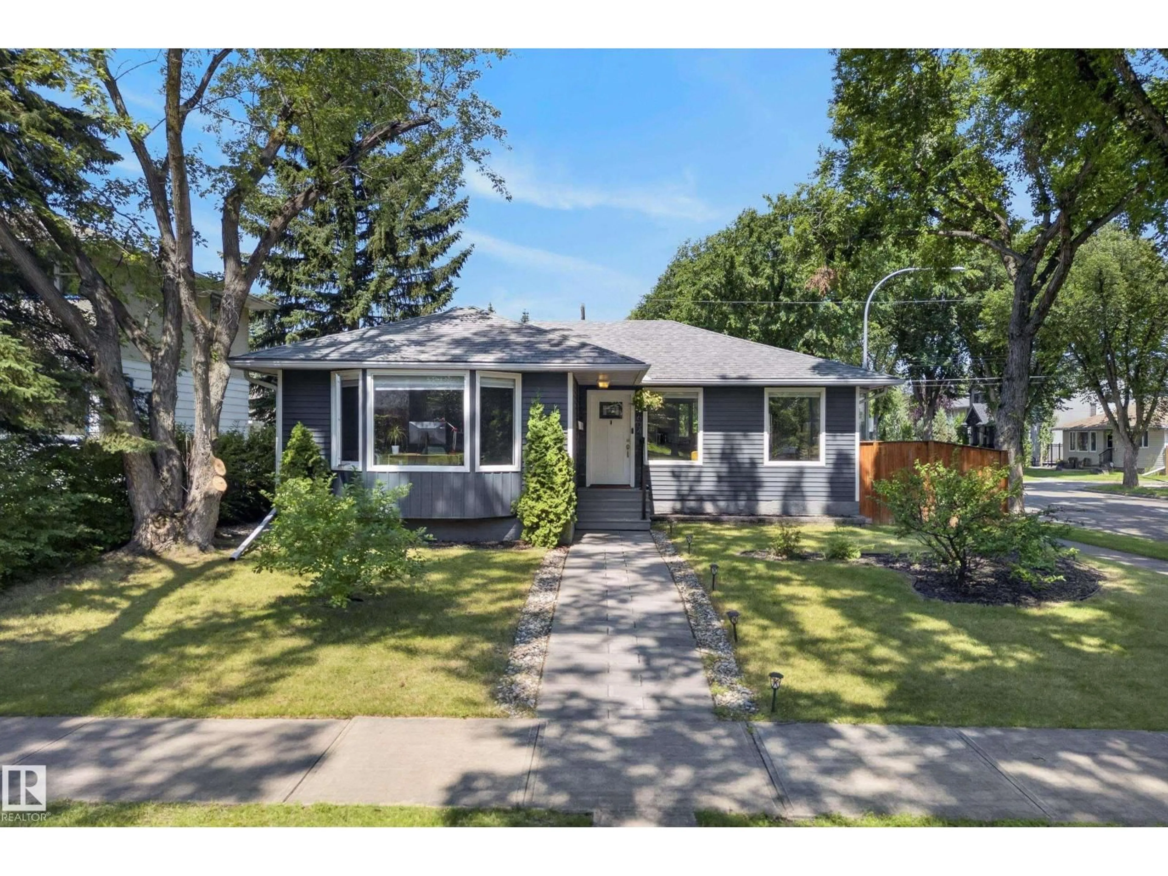Home with vinyl exterior material, street for 14604 93 AV, Edmonton Alberta T5R5G6