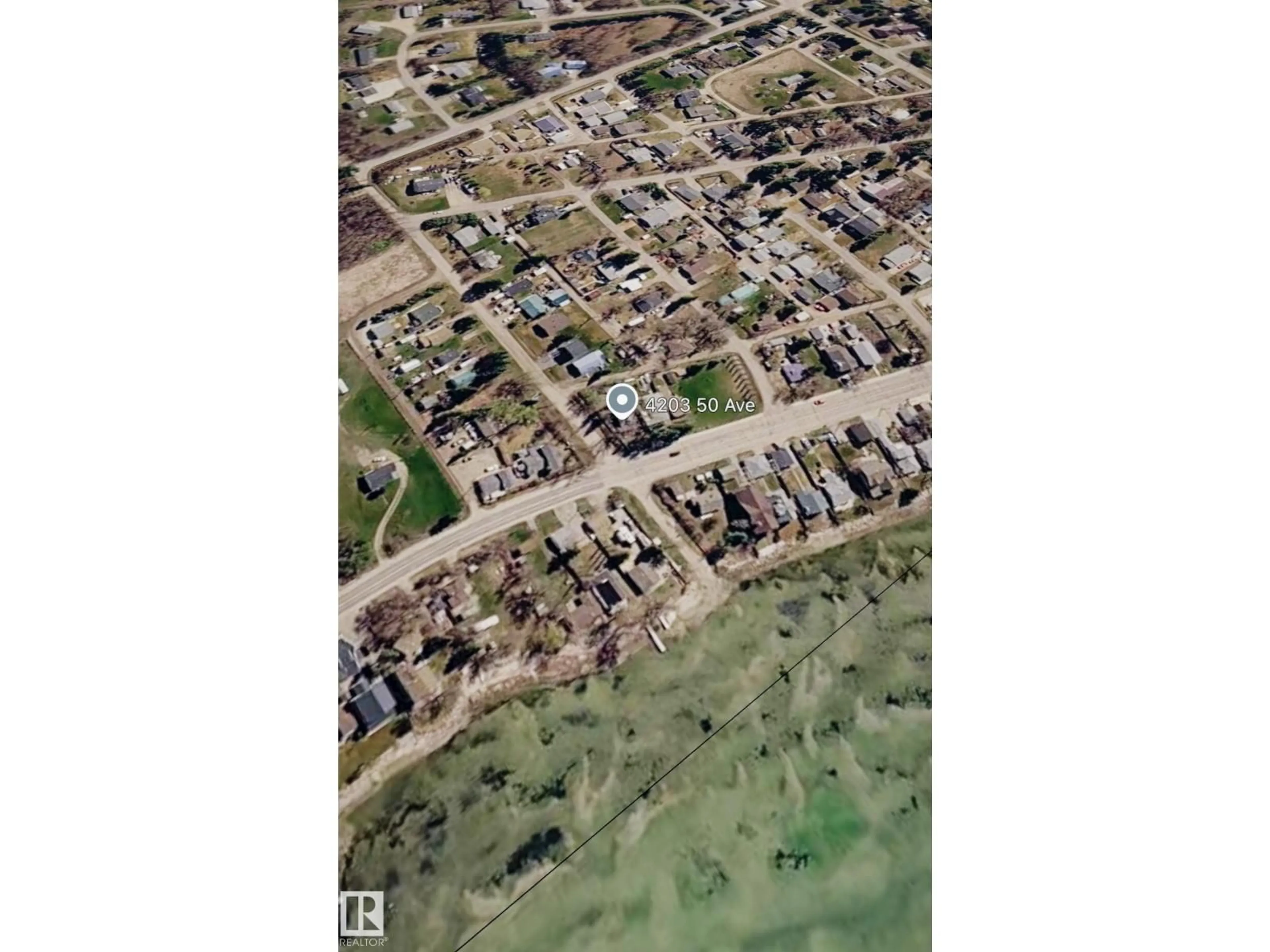 A pic from outside/outdoor area/front of a property/back of a property/a pic from drone, street for 4203 50 AV, Rural Lac Ste. Anne County Alberta T0E0A0