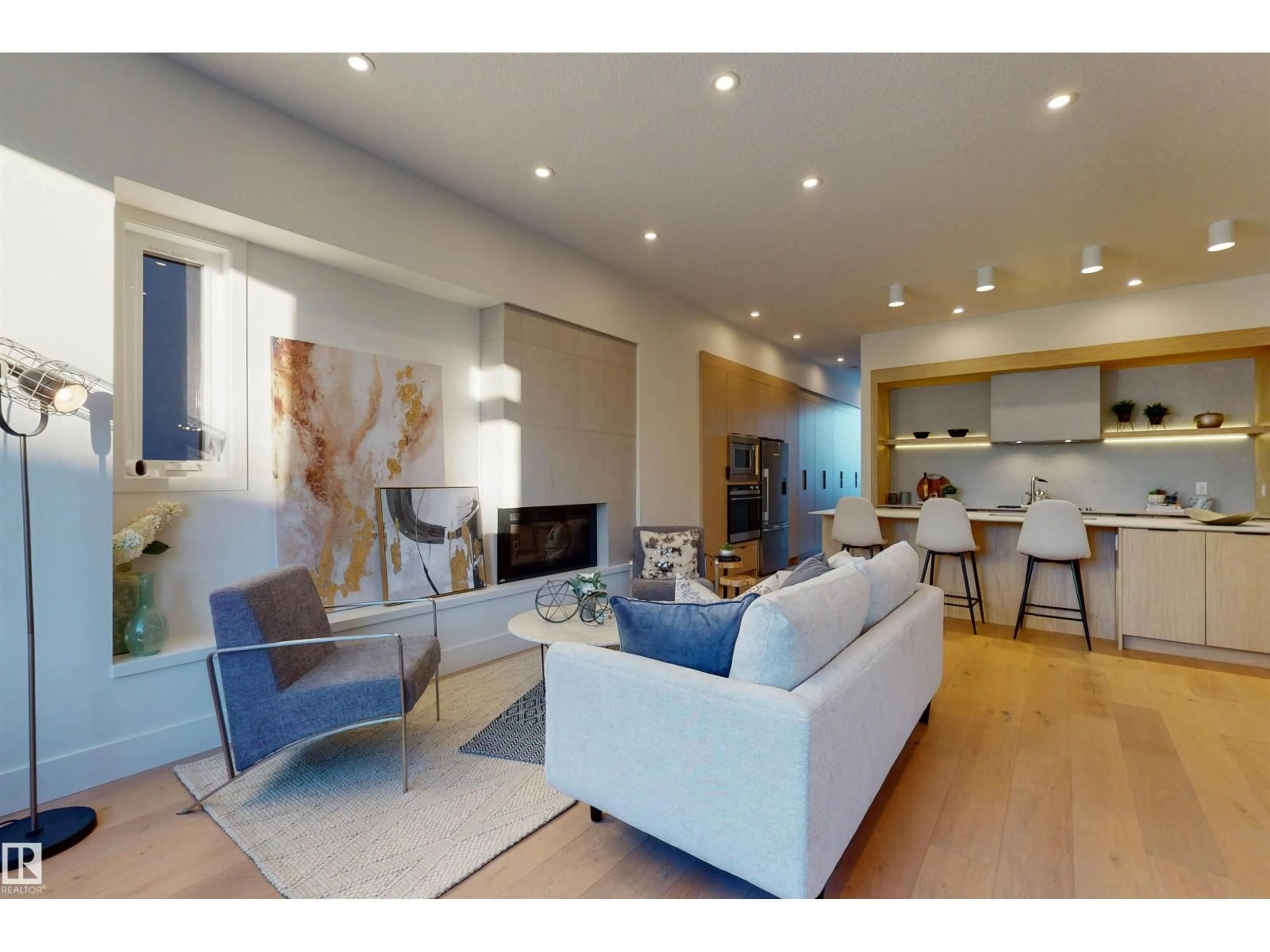 Living room with furniture, wood/laminate floor for NW - 10515 75 ST, Edmonton Alberta T6A2Z6