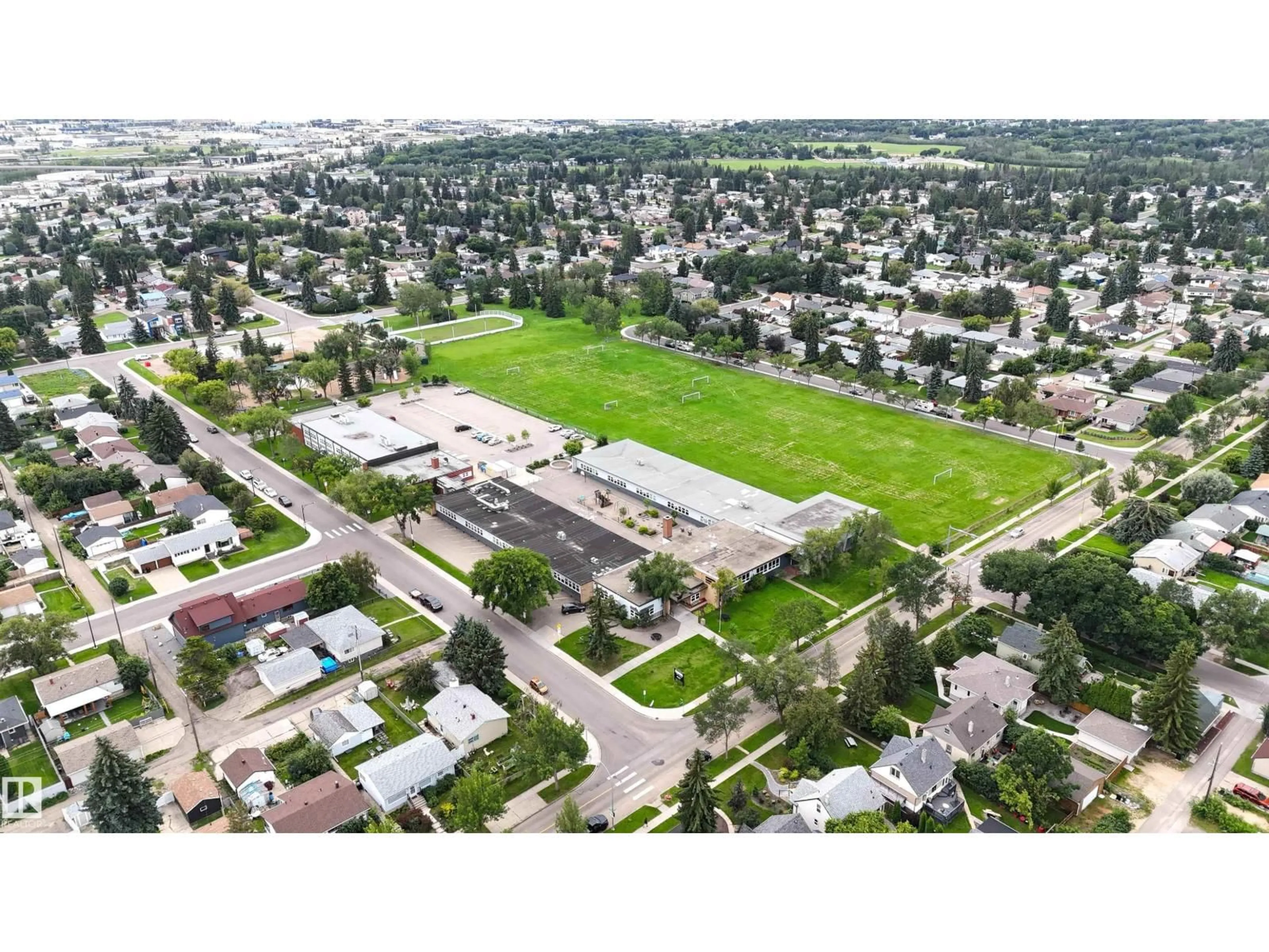 A pic from outside/outdoor area/front of a property/back of a property/a pic from drone, street for 7311 77 ST, Edmonton Alberta T6C2L3