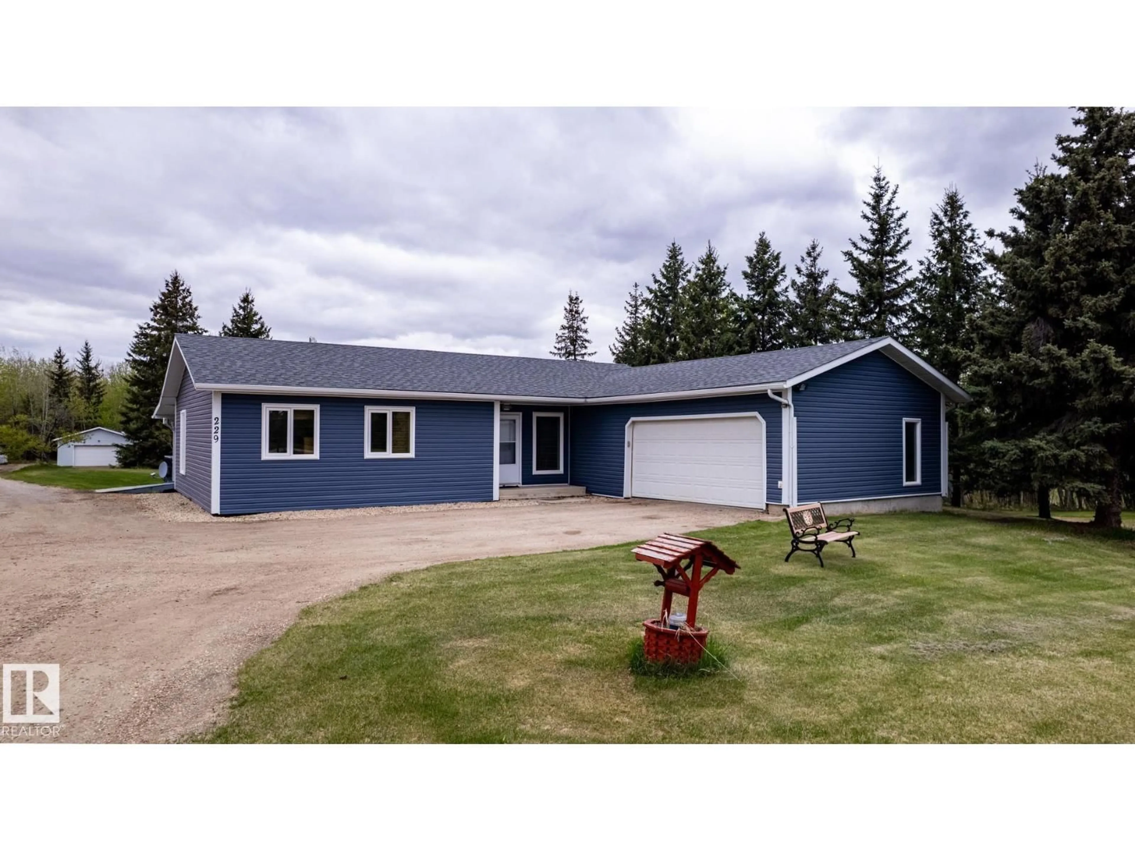 Home with vinyl exterior material, street for 229 22450 TWP ROAD 514, Rural Strathcona County Alberta T8C1H5