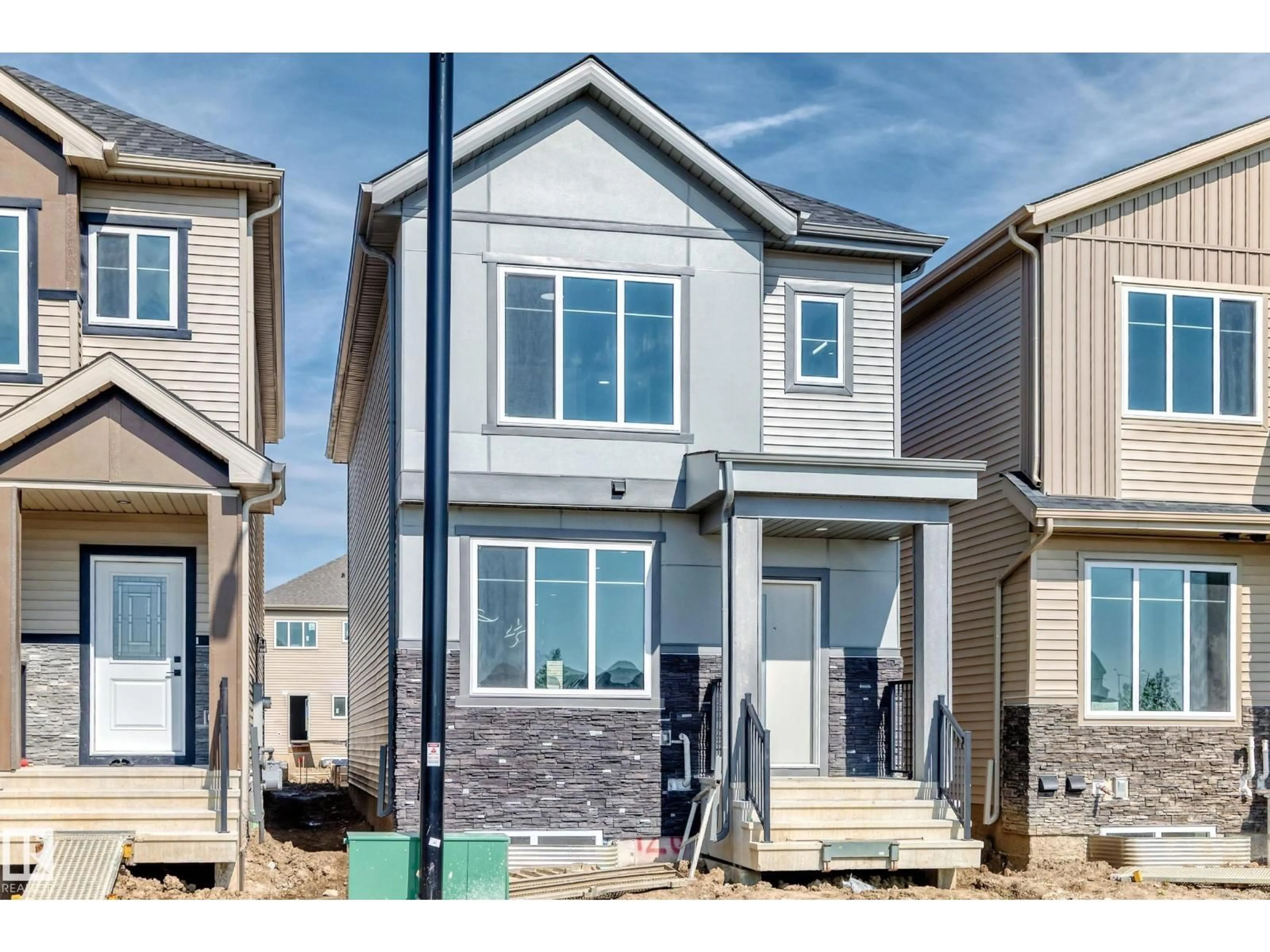Home with vinyl exterior material, street for 426 CRYSTAL CREEK LI, Leduc Alberta T9E0X5