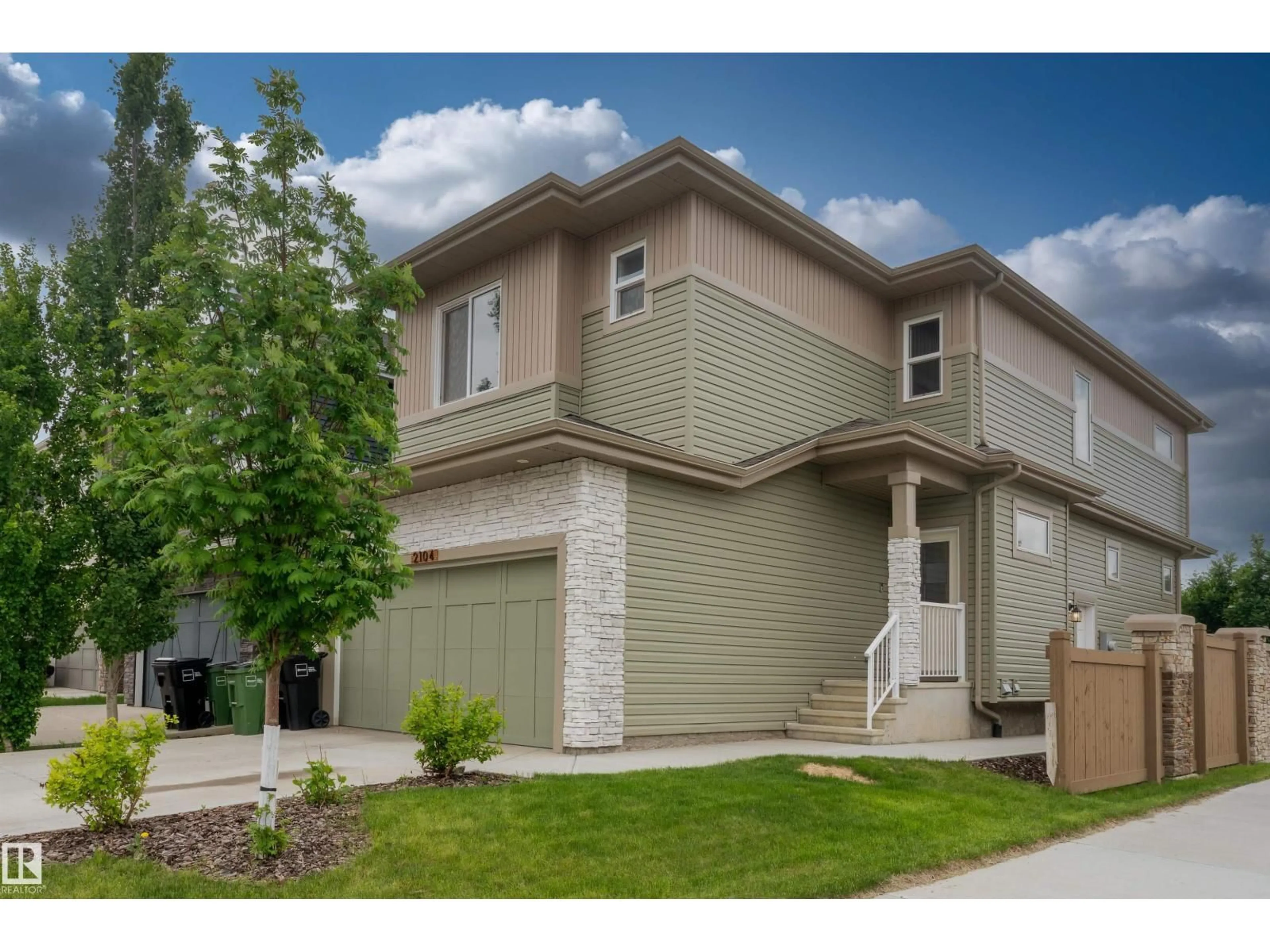 Home with vinyl exterior material, street for SW - 2104 160 ST, Edmonton Alberta T6W4E5