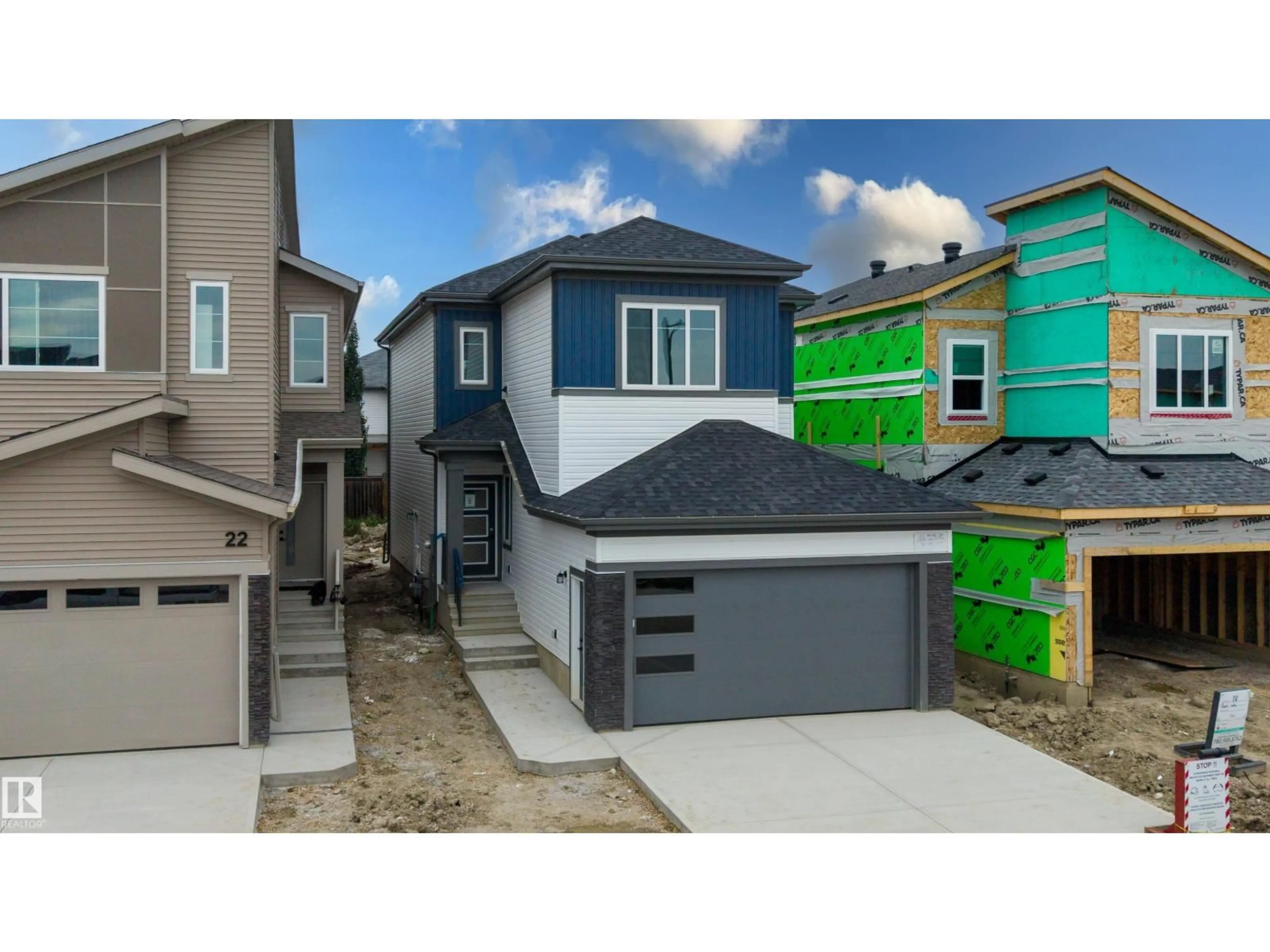 Home with vinyl exterior material, street for 20 MUNN WY, Leduc Alberta T9E1X9