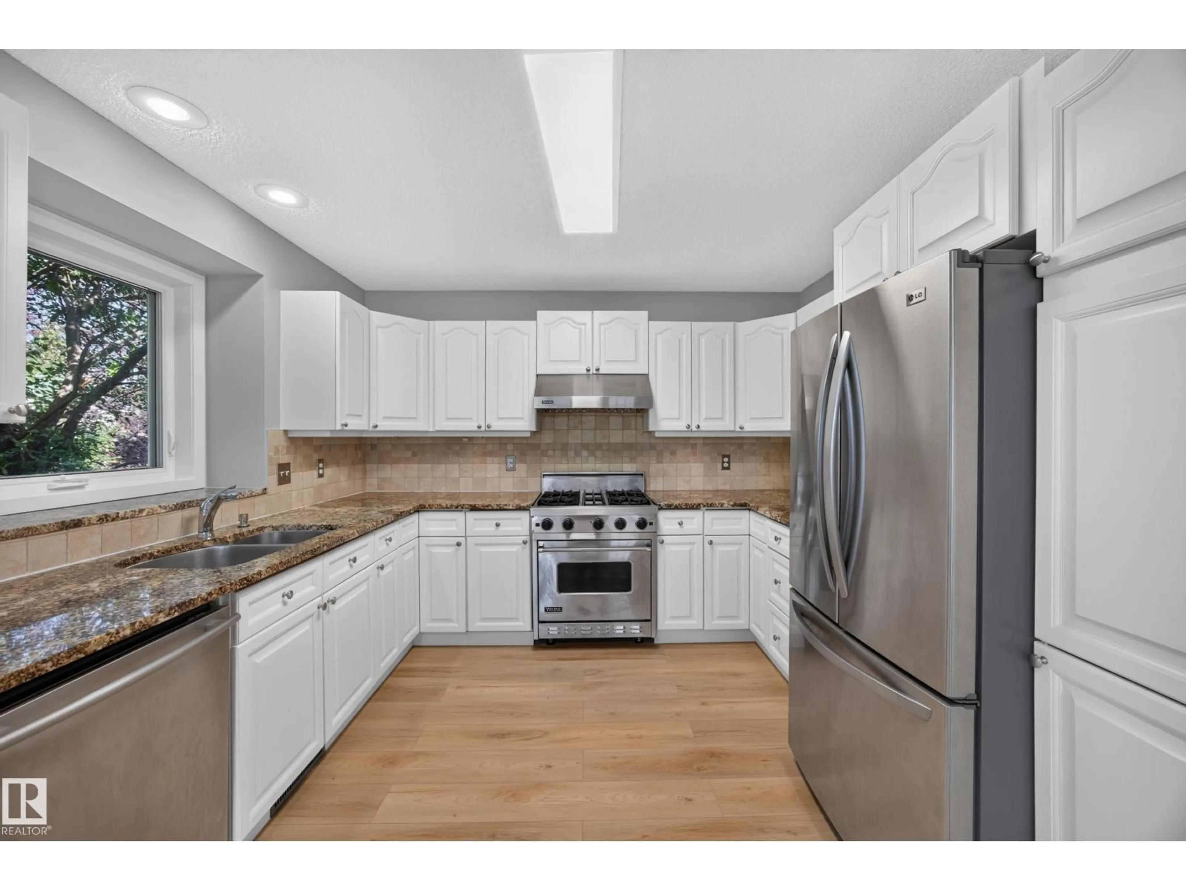 Open concept kitchen, unknown for NW - 3640 31 ST, Edmonton Alberta T6T1G8