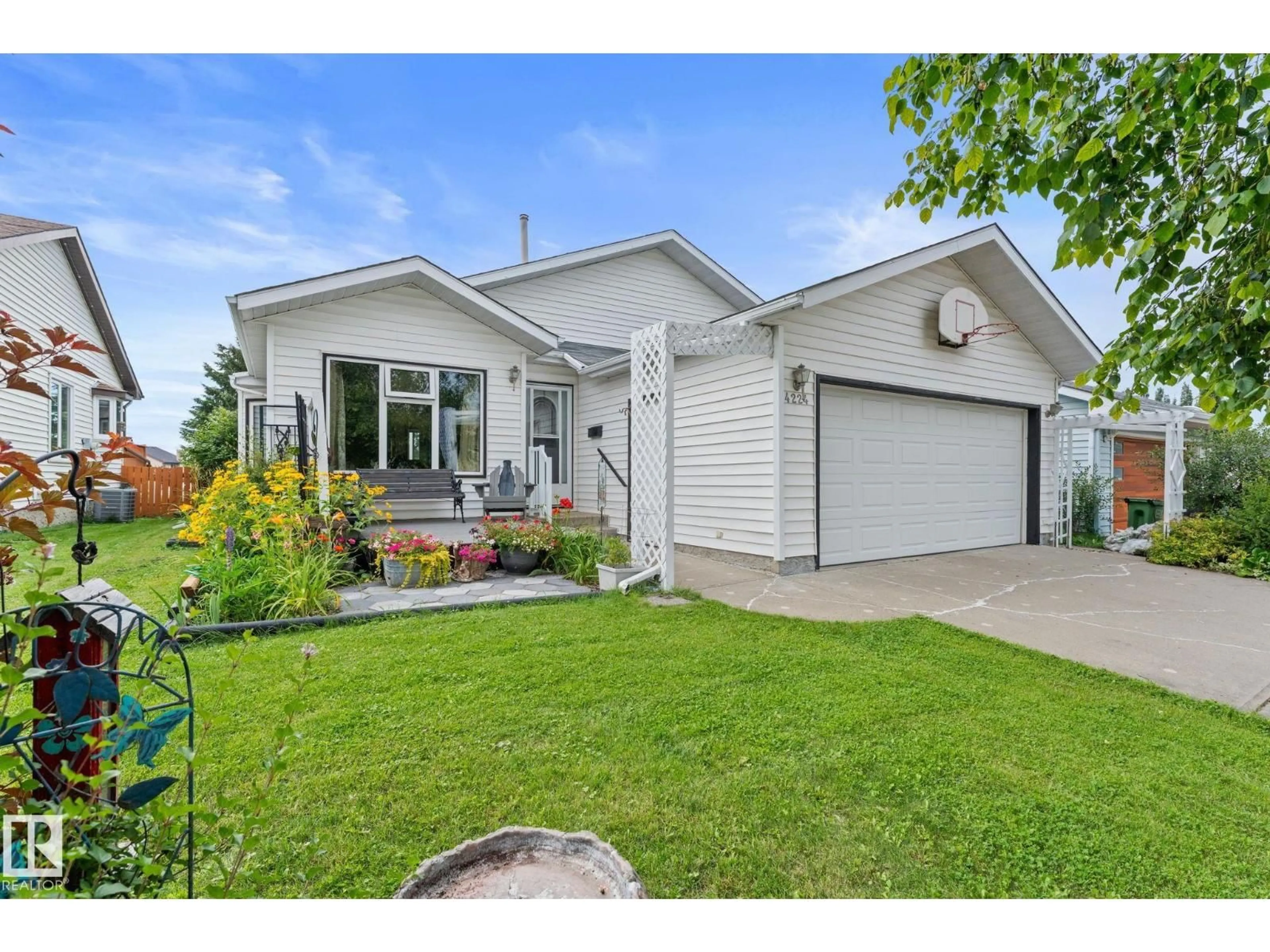 Home with vinyl exterior material, street for 4224 33A ST, Edmonton Alberta T6T1E7