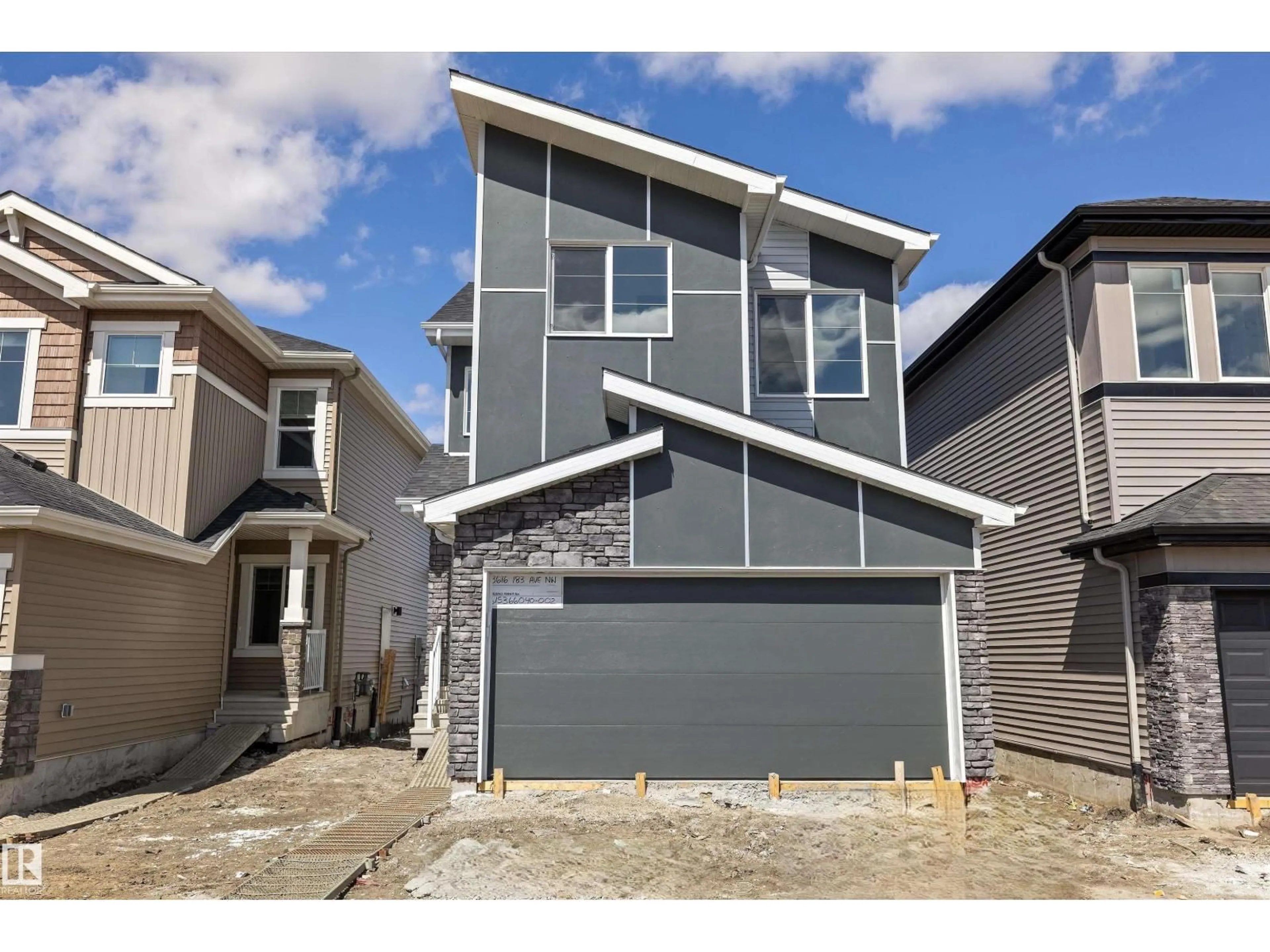 Home with vinyl exterior material, street for 8616 183 AV, Edmonton Alberta T5Z0X5