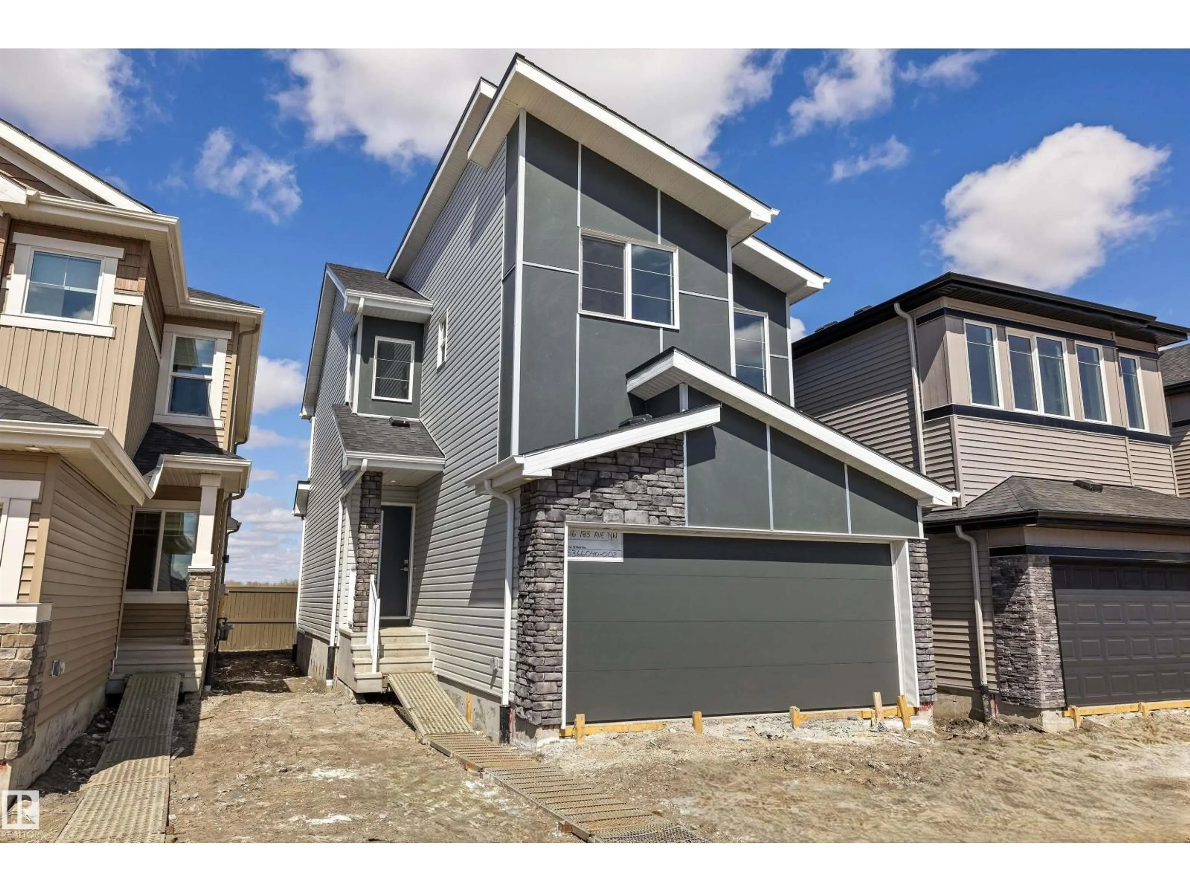 Home with vinyl exterior material, street for 8616 183 AV, Edmonton Alberta T5Z0X5
