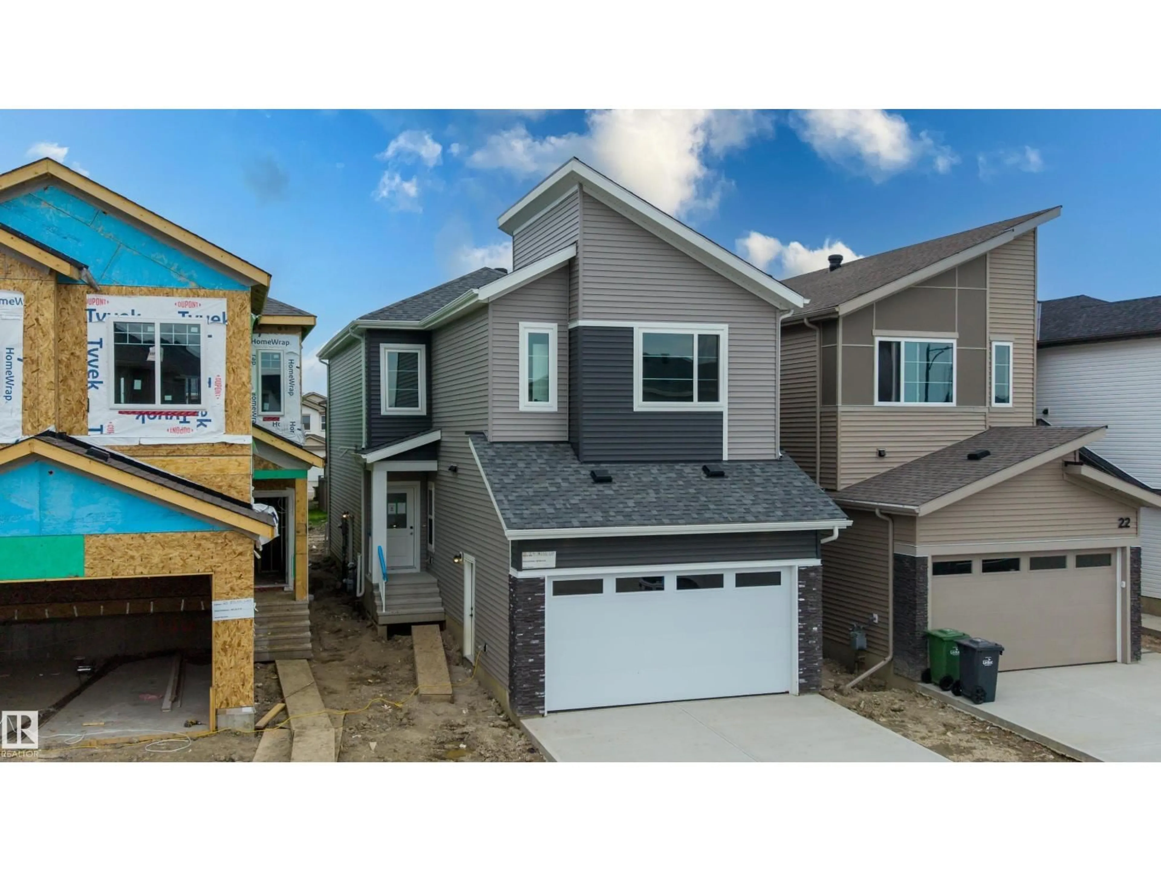 Home with vinyl exterior material, street for 24 MUNN WY, Leduc Alberta T9E1X9