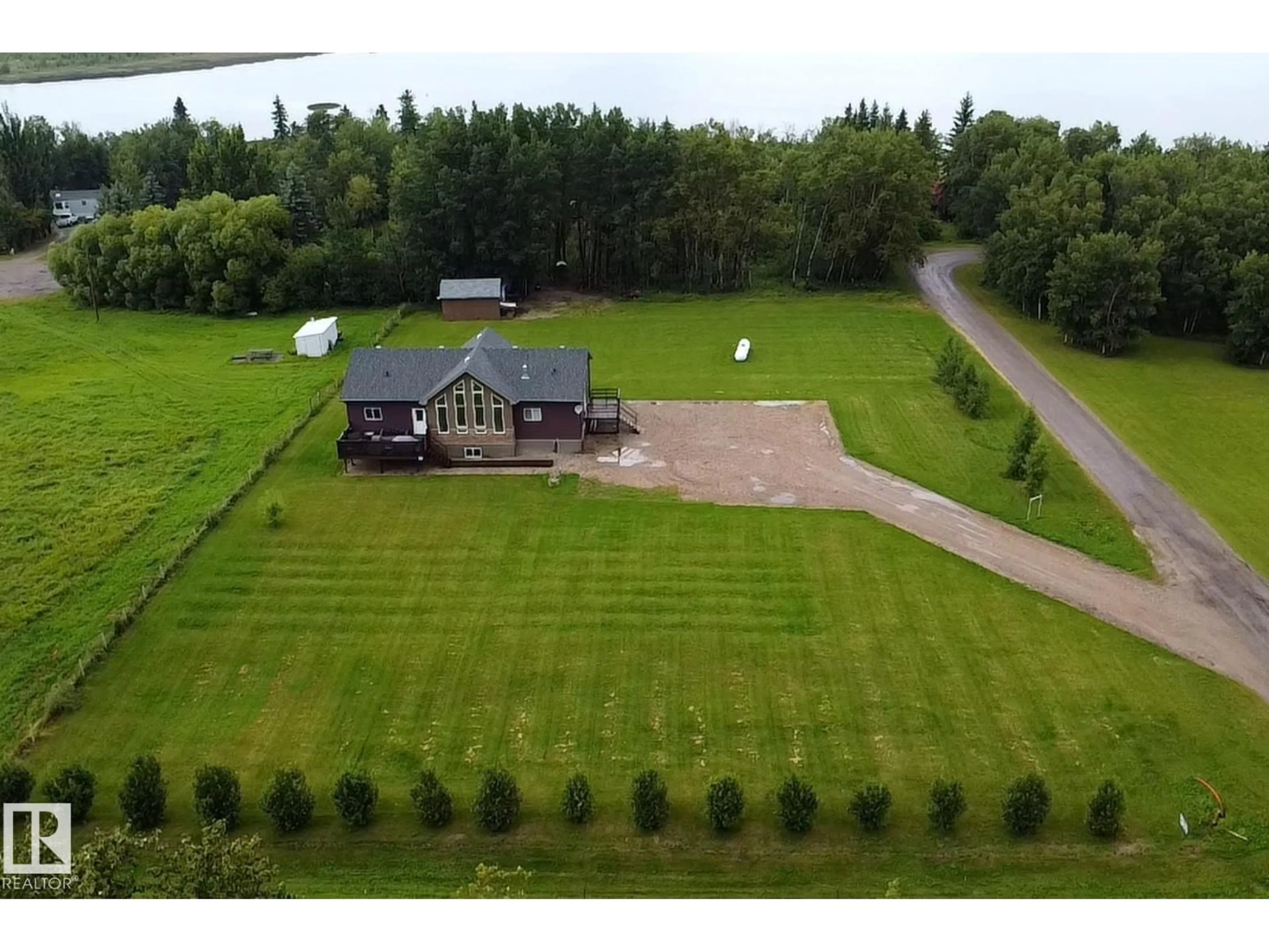 A pic from outside/outdoor area/front of a property/back of a property/a pic from drone, building for 22 45416 TWP RD 593 A, Rural Bonnyville M.D. Alberta T9N2J6