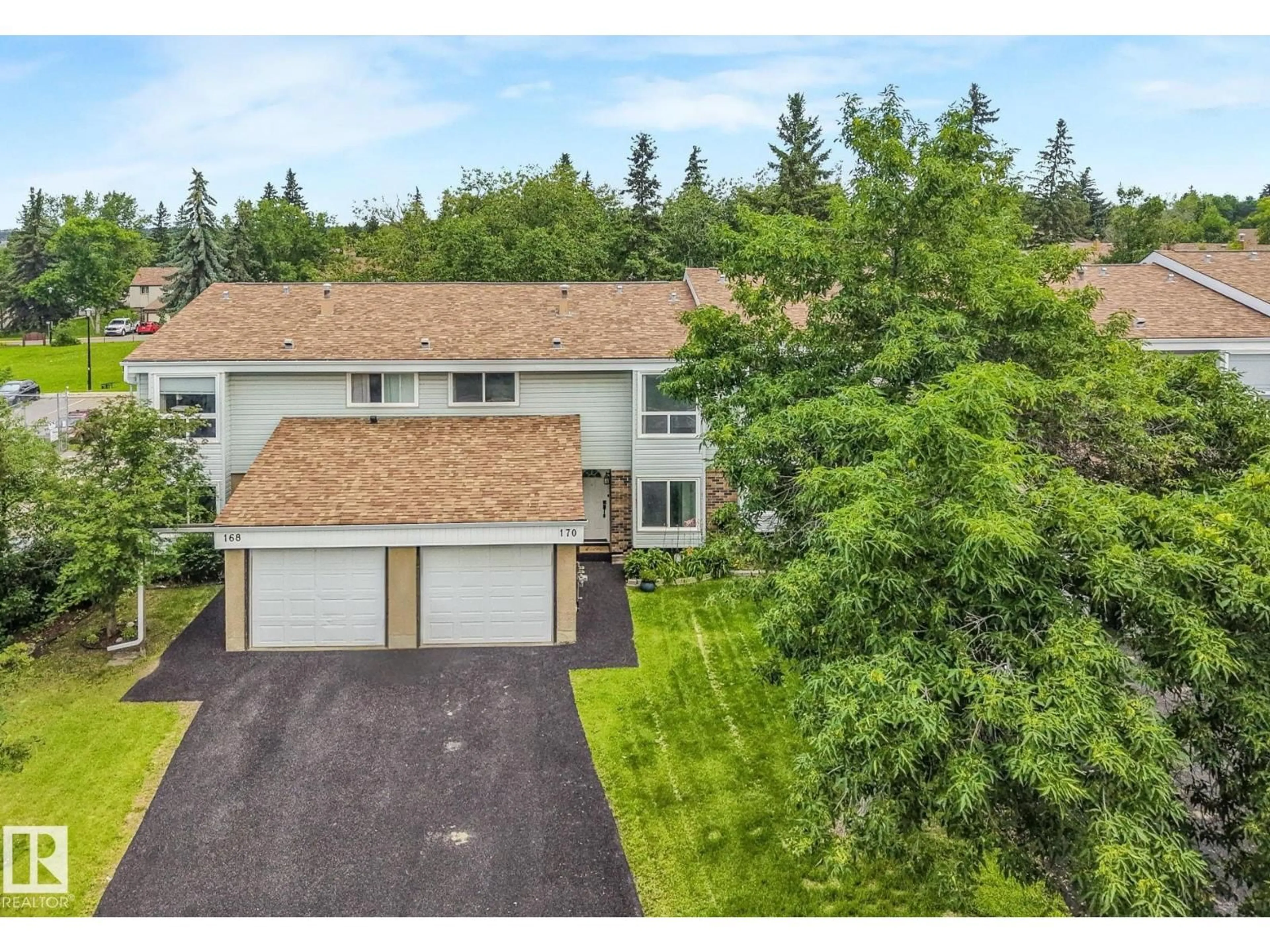 A pic from outside/outdoor area/front of a property/back of a property/a pic from drone, street for 170 GRANDIN VG, St. Albert Alberta T8N2J3