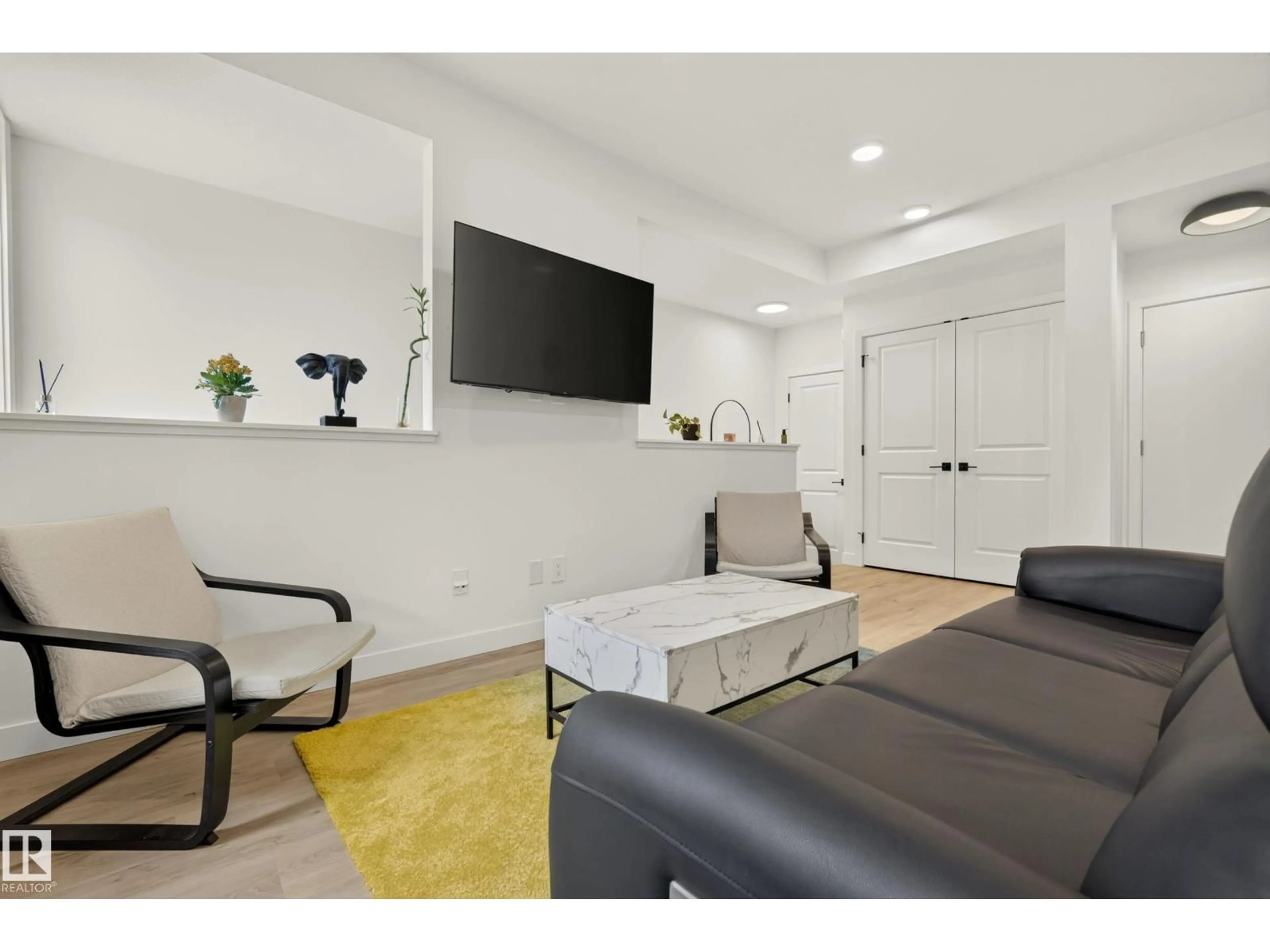 Living room with furniture, unknown for 53 16231 19 AV SW, Edmonton Alberta T6W5C6