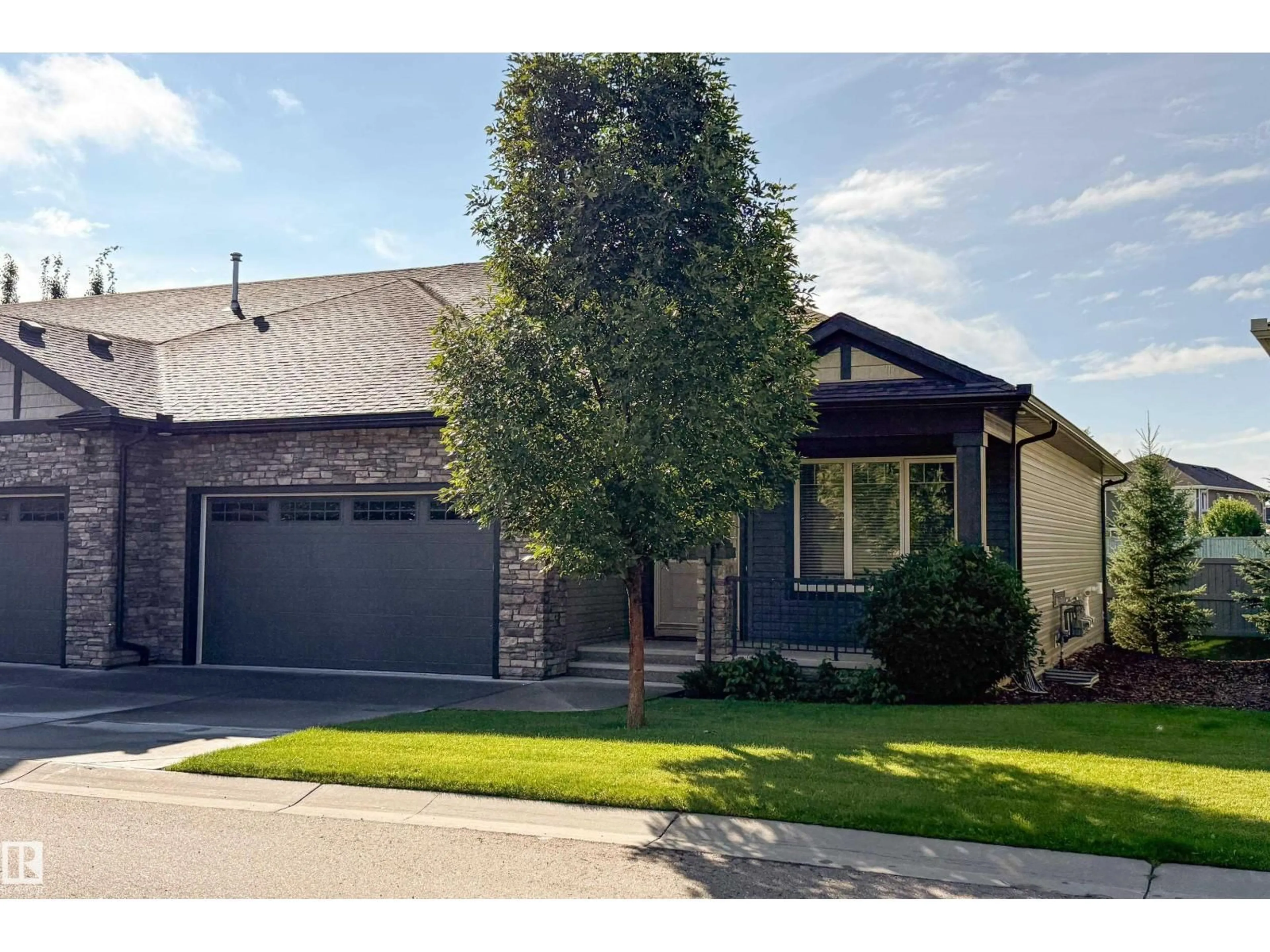 Home with vinyl exterior material, street for 7115 - 18 ARMOUR LINK LI, Edmonton Alberta T6W2V2