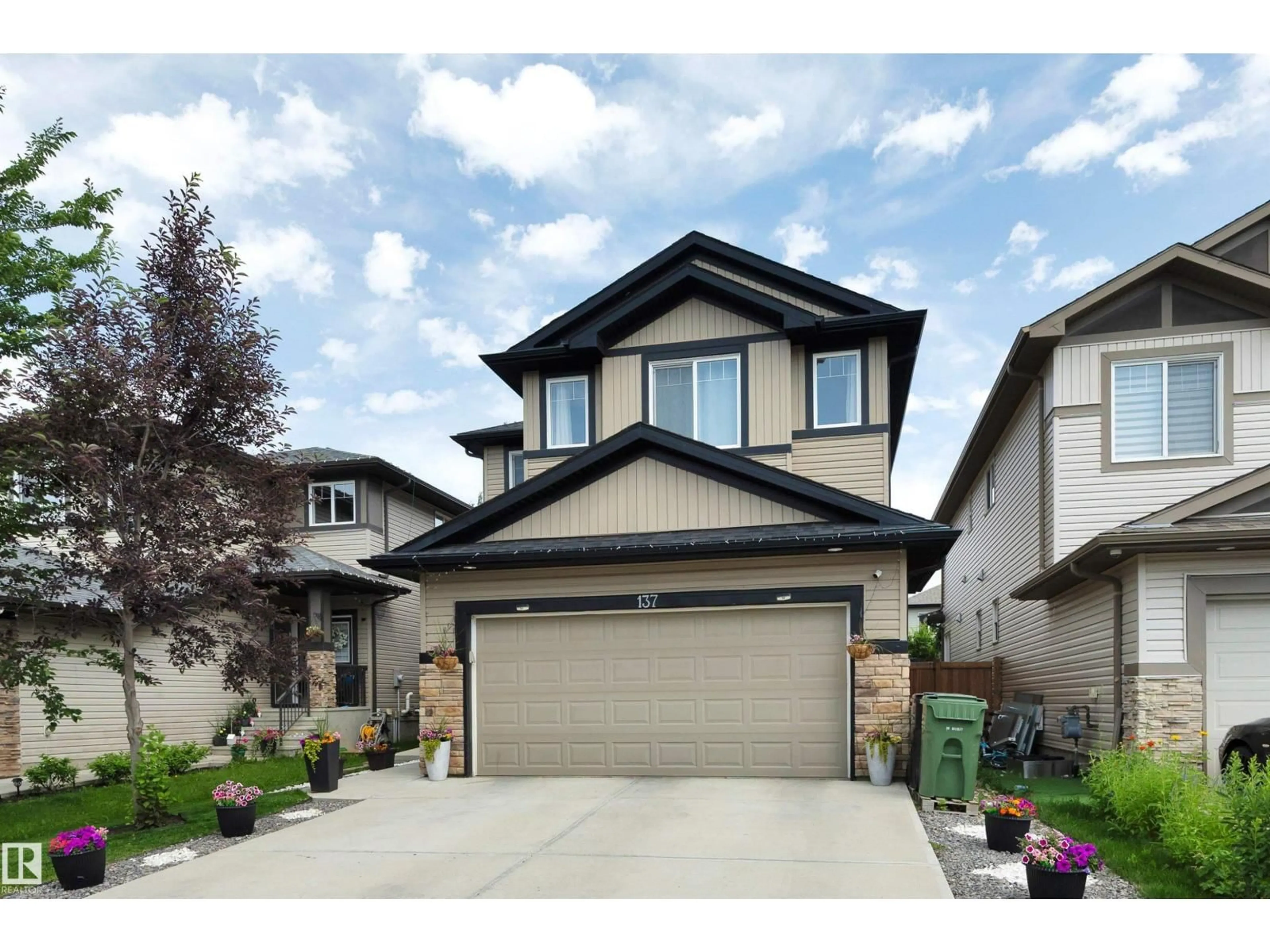 Home with vinyl exterior material, street for 137 AWENTIA ST, Leduc Alberta T9E1H4