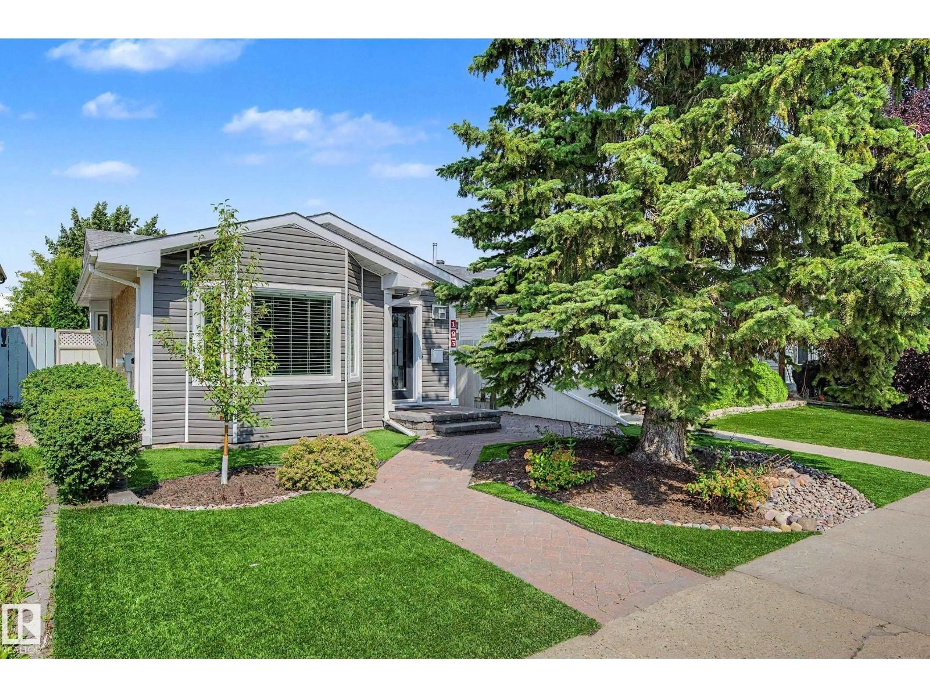 Home with vinyl exterior material, street for 193 KINISKI CR, Edmonton Alberta T6L5E2