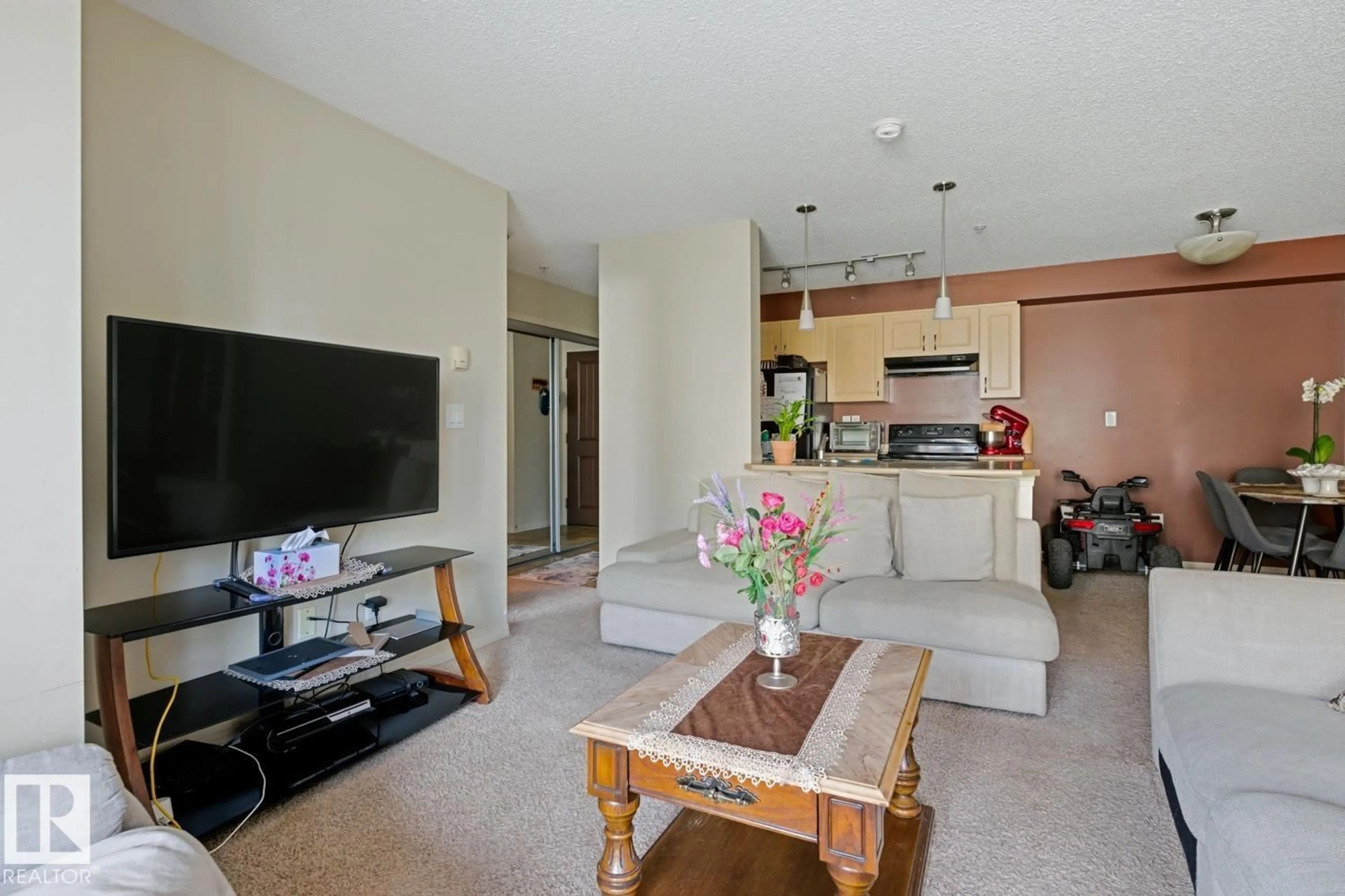 Living room with furniture, unknown for #106 - 13907 136 ST, Edmonton Alberta T6V1Y5