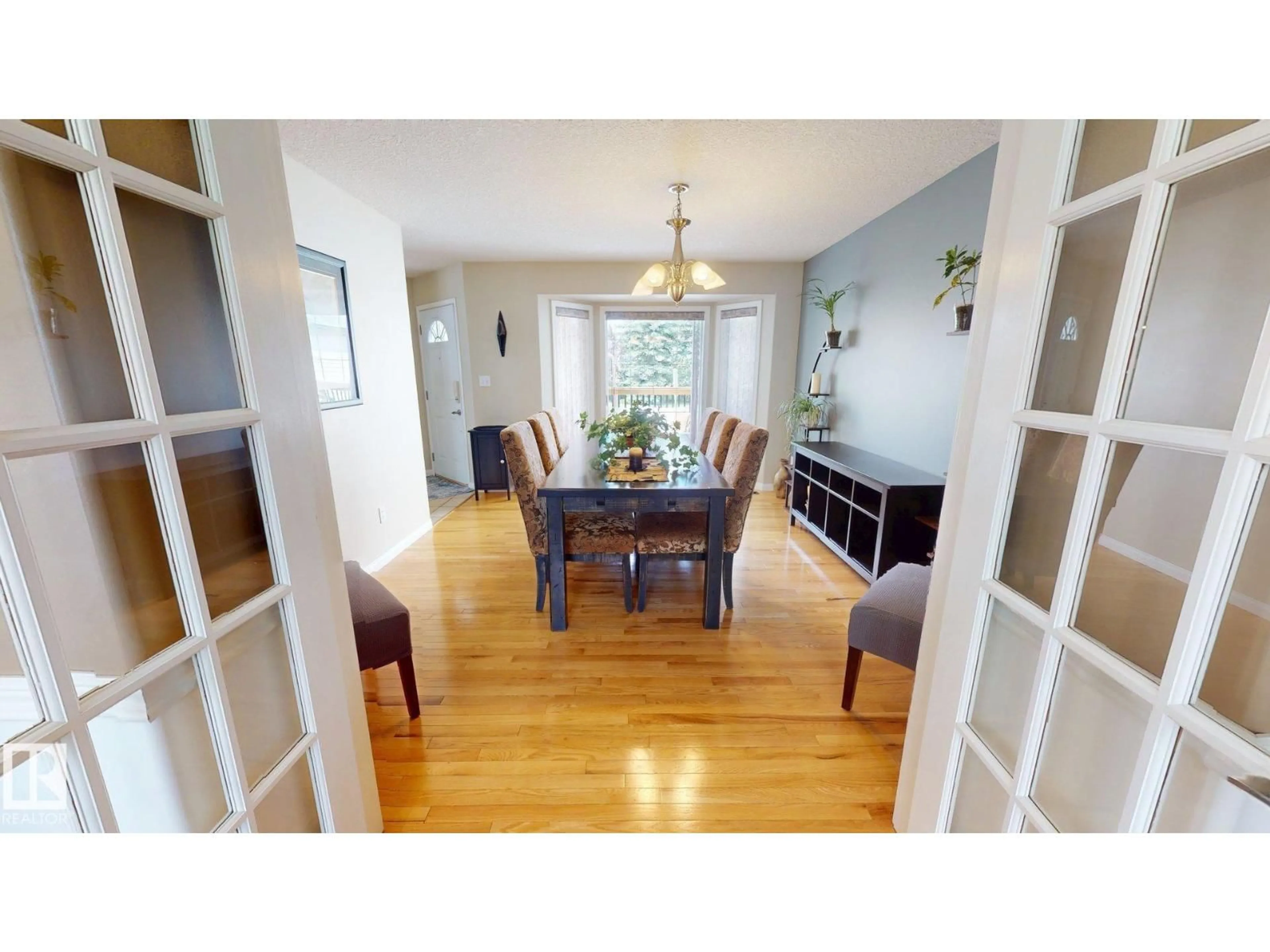 Dining room, wood/laminate floor for 55 CATALINA DR, Sherwood Park Alberta T8H2B4