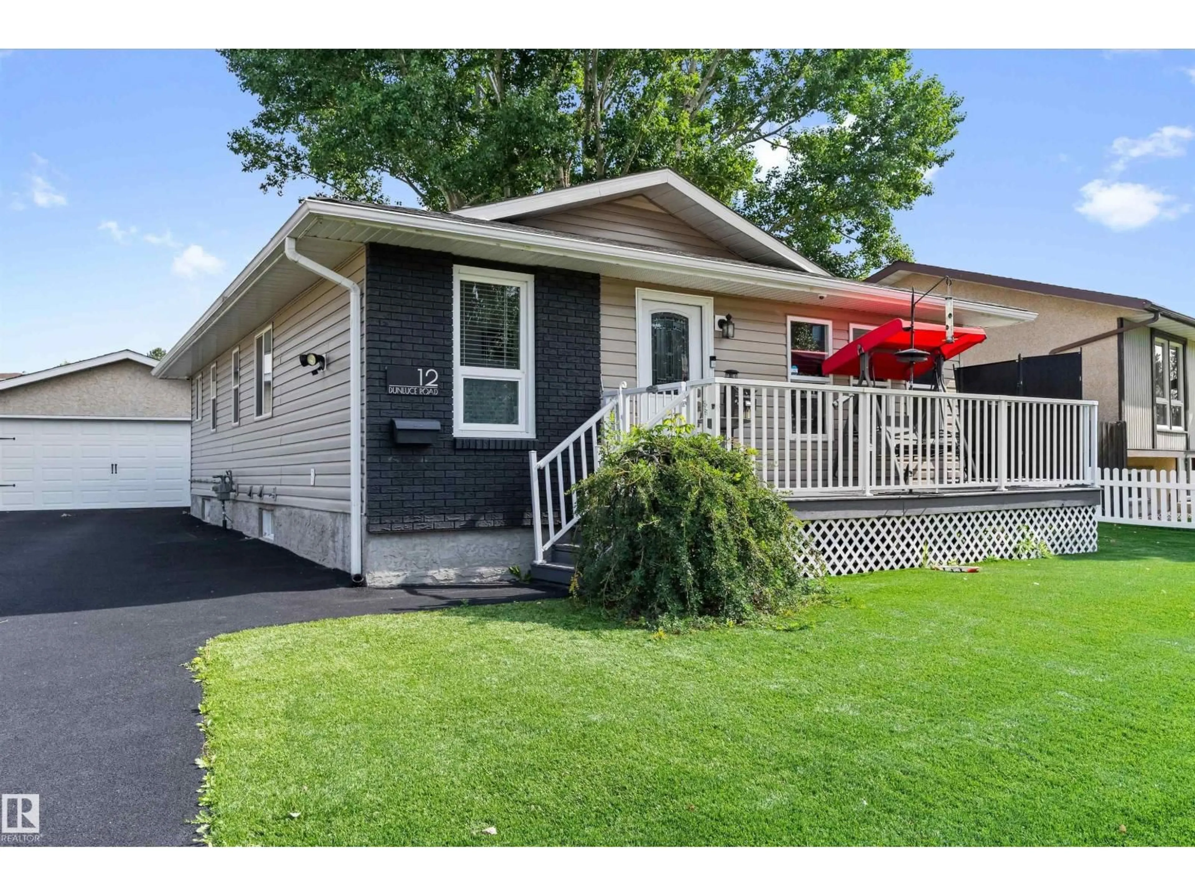 Home with vinyl exterior material, street for 12 DUNLUCE RD, Edmonton Alberta T5X3V2