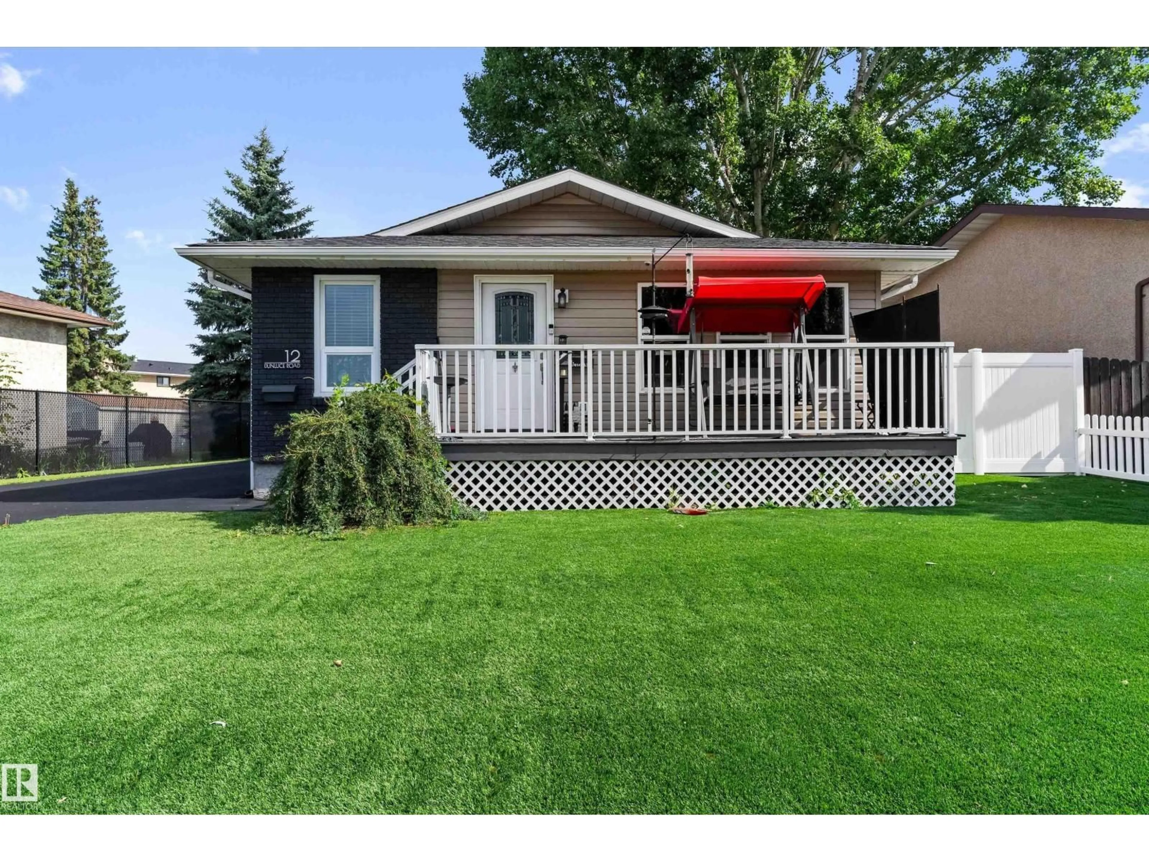 Home with vinyl exterior material, street for 12 DUNLUCE RD, Edmonton Alberta T5X3V2