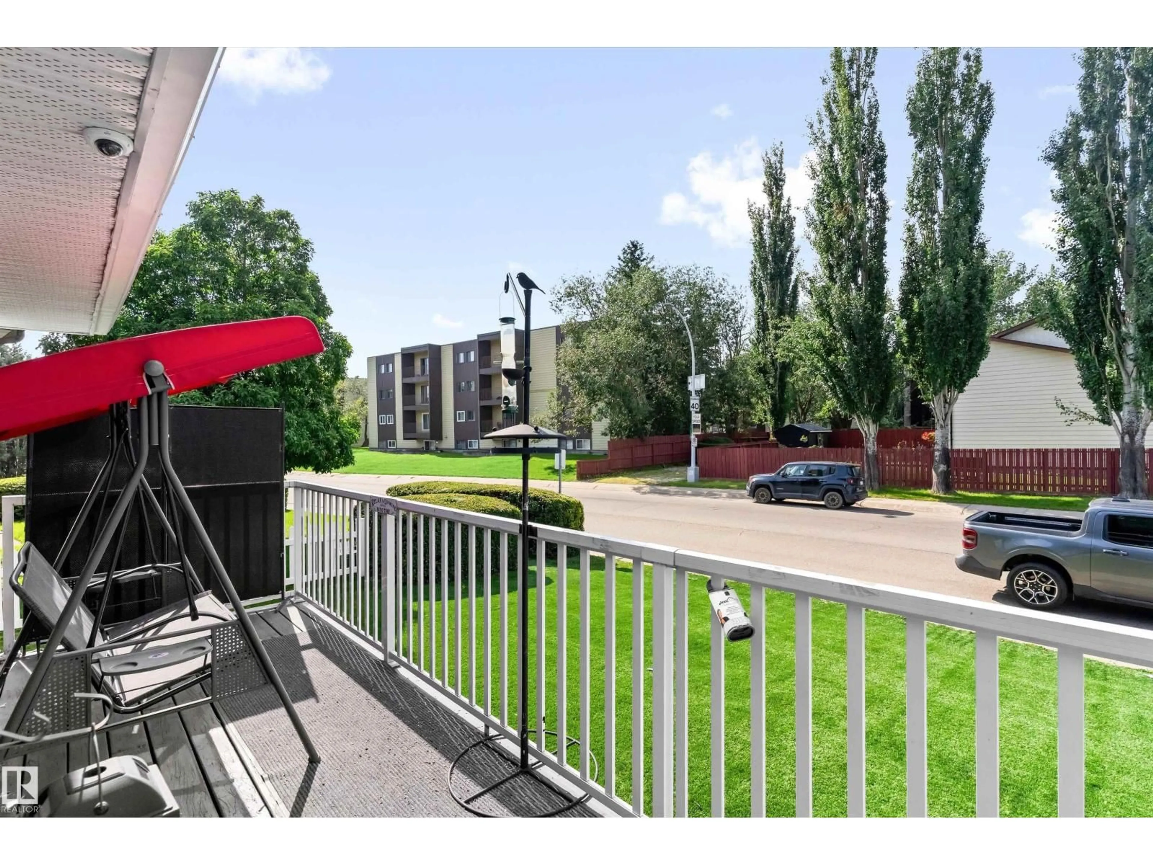 Patio, city buildings view from balcony for 12 DUNLUCE RD, Edmonton Alberta T5X3V2