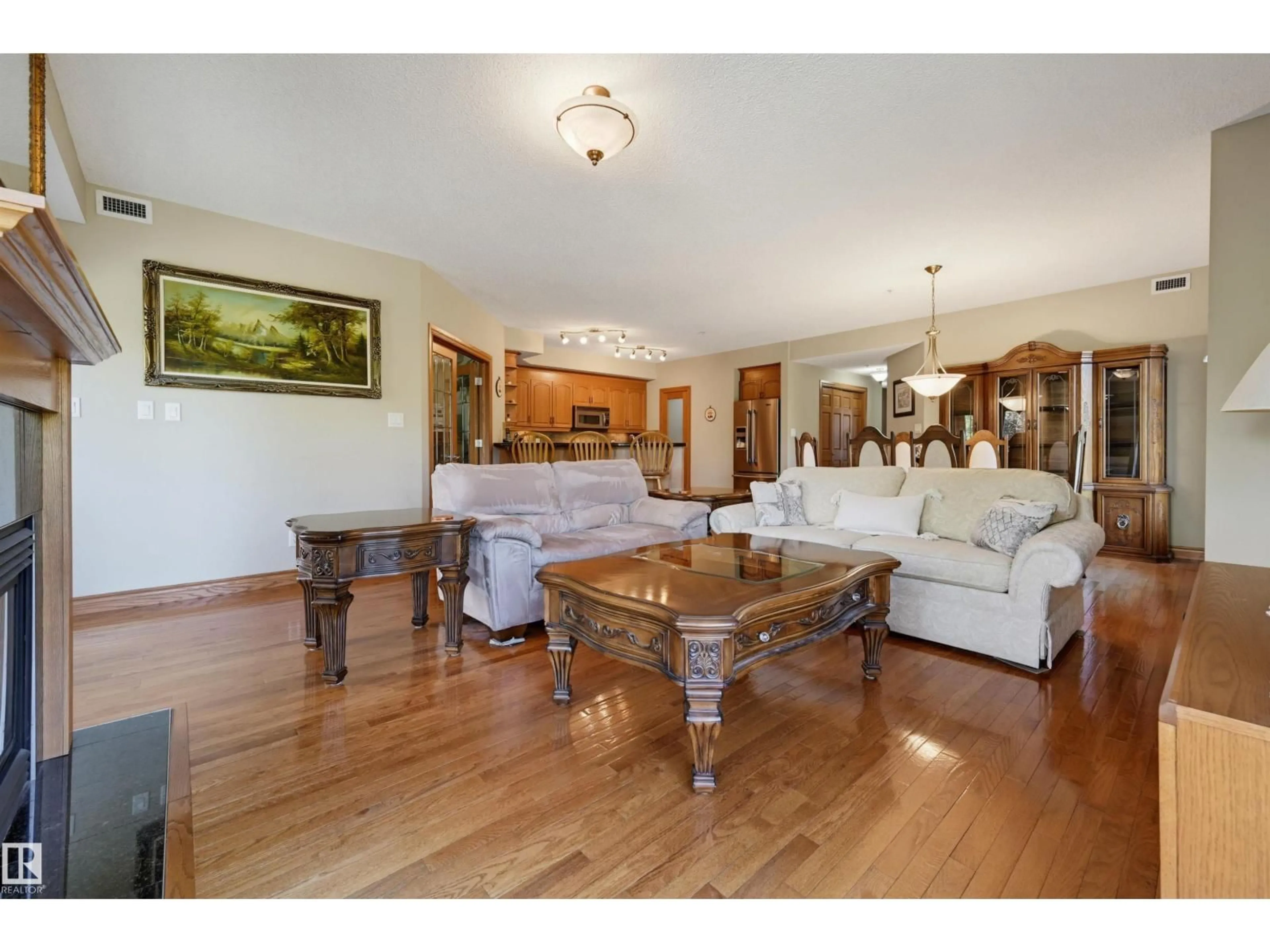 Living room with furniture, wood/laminate floor for #301 - 9819 96A ST NW, Edmonton Alberta T6A4A2