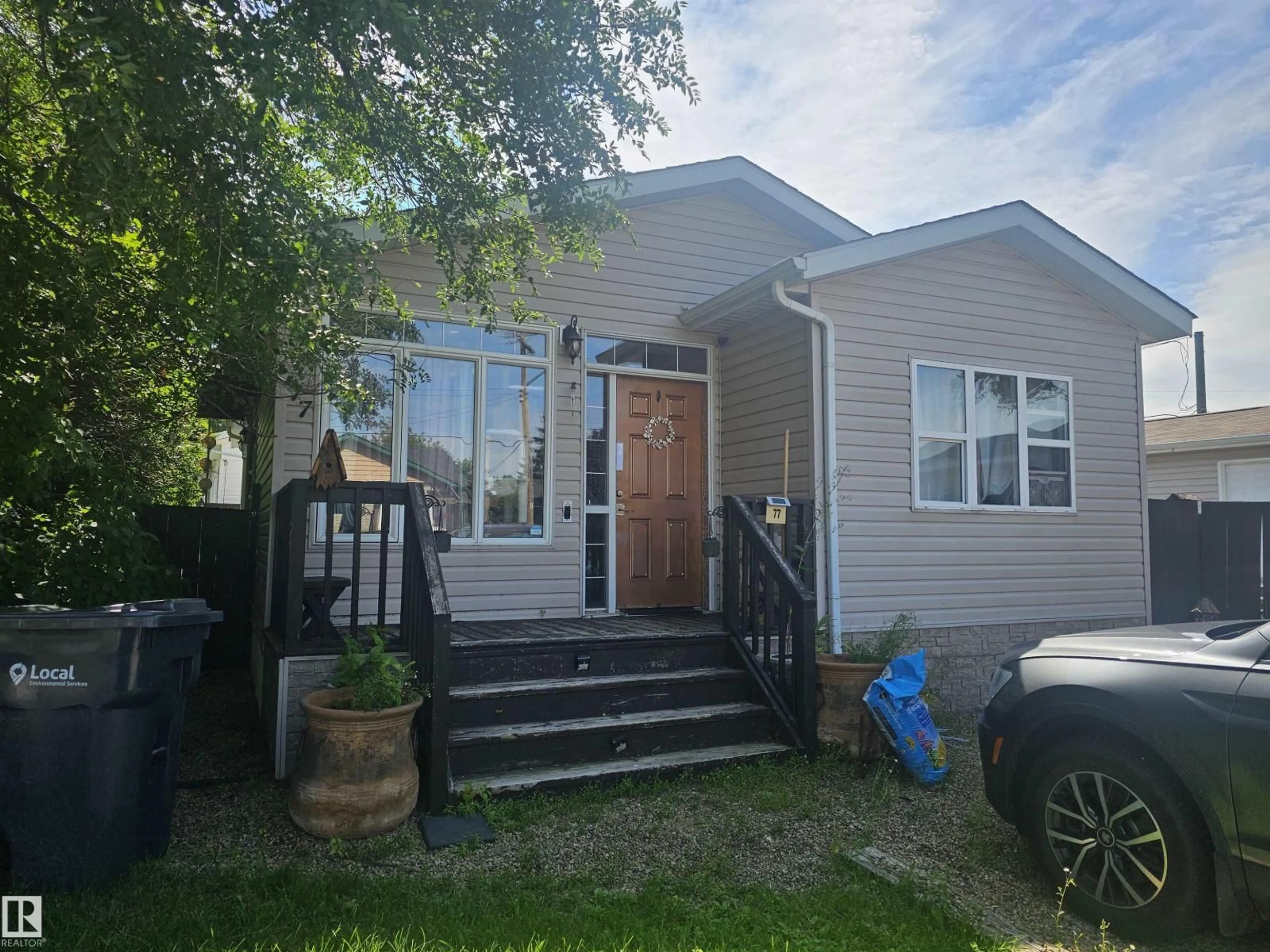 Home with vinyl exterior material, street for 77 305 CALAHOO RD, Spruce Grove Alberta T7X3K5