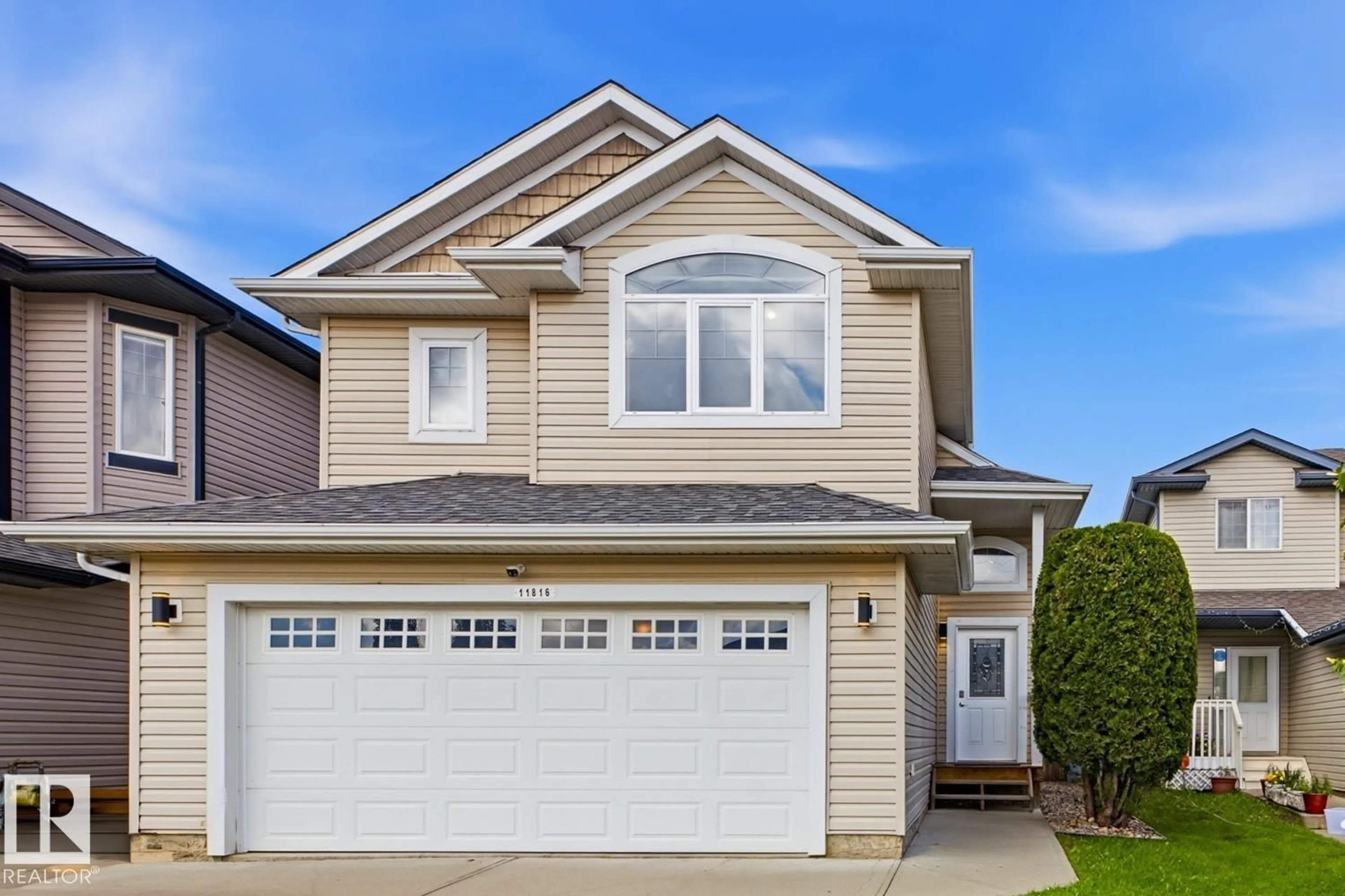 Home with vinyl exterior material, street for 11816 168 AV, Edmonton Alberta T5X0B1