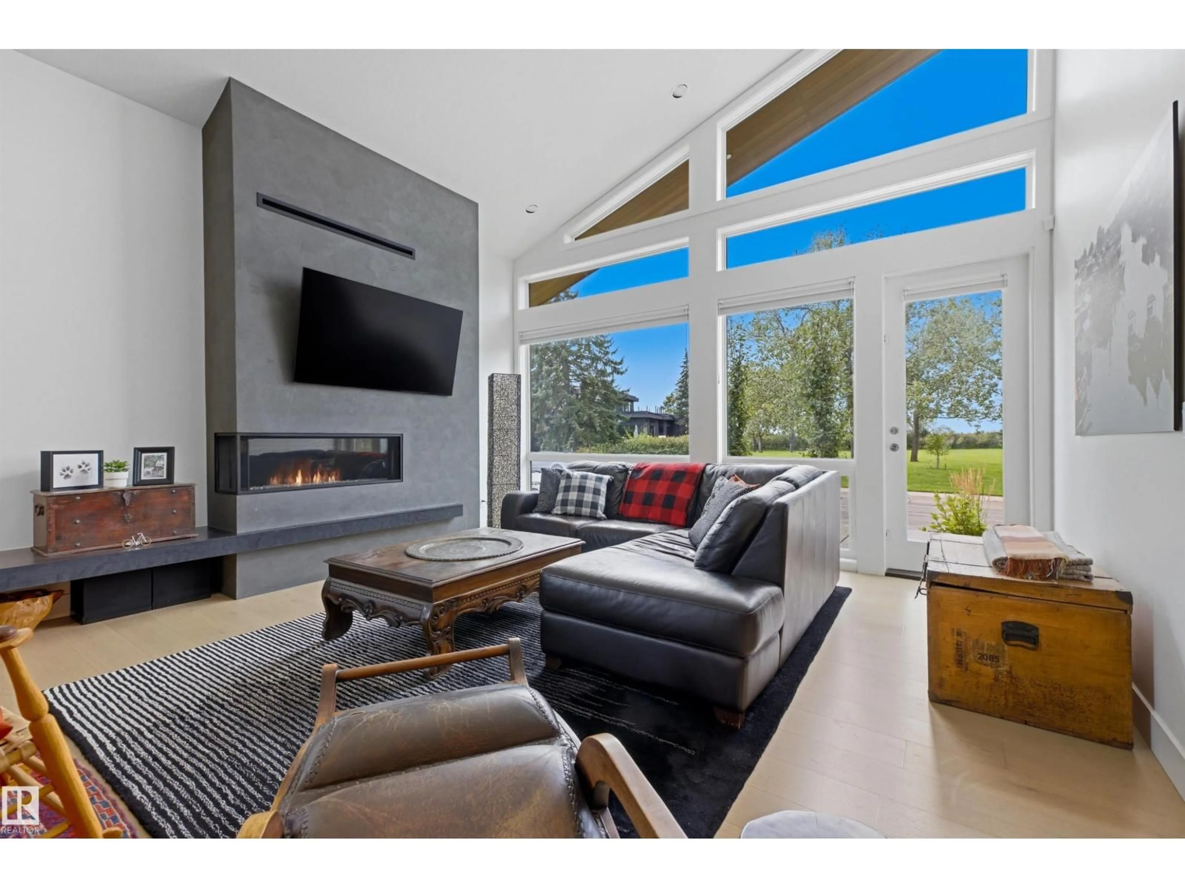 Living room with furniture, wood/laminate floor for 4111 ASPEN DR, Edmonton Alberta T6J2B5